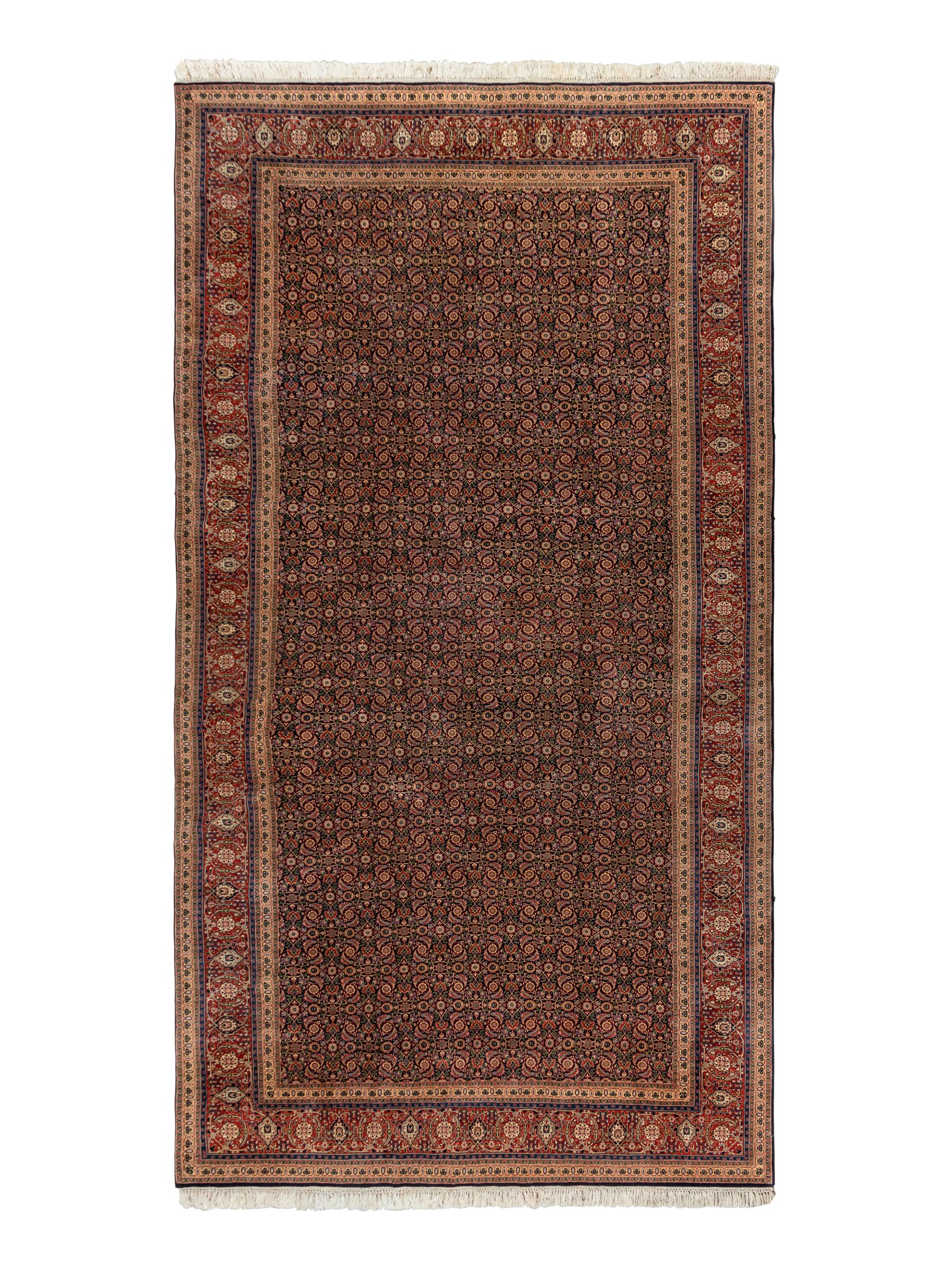 A Persian Meshed Wool Rug