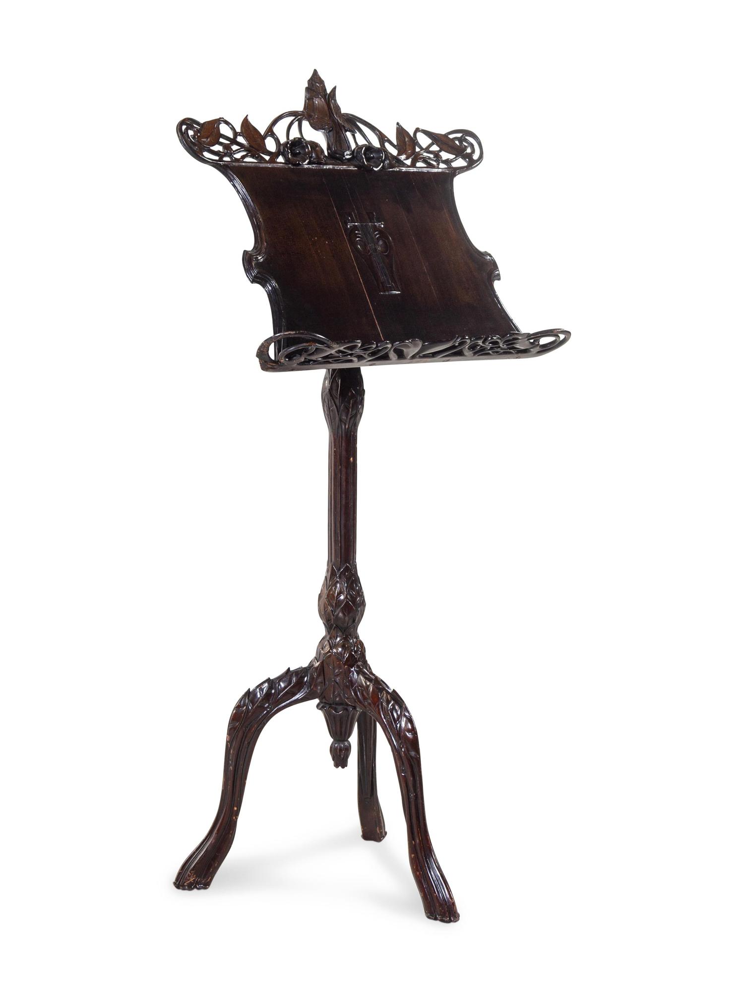 An Art Nouveau Style Carved Music Stand