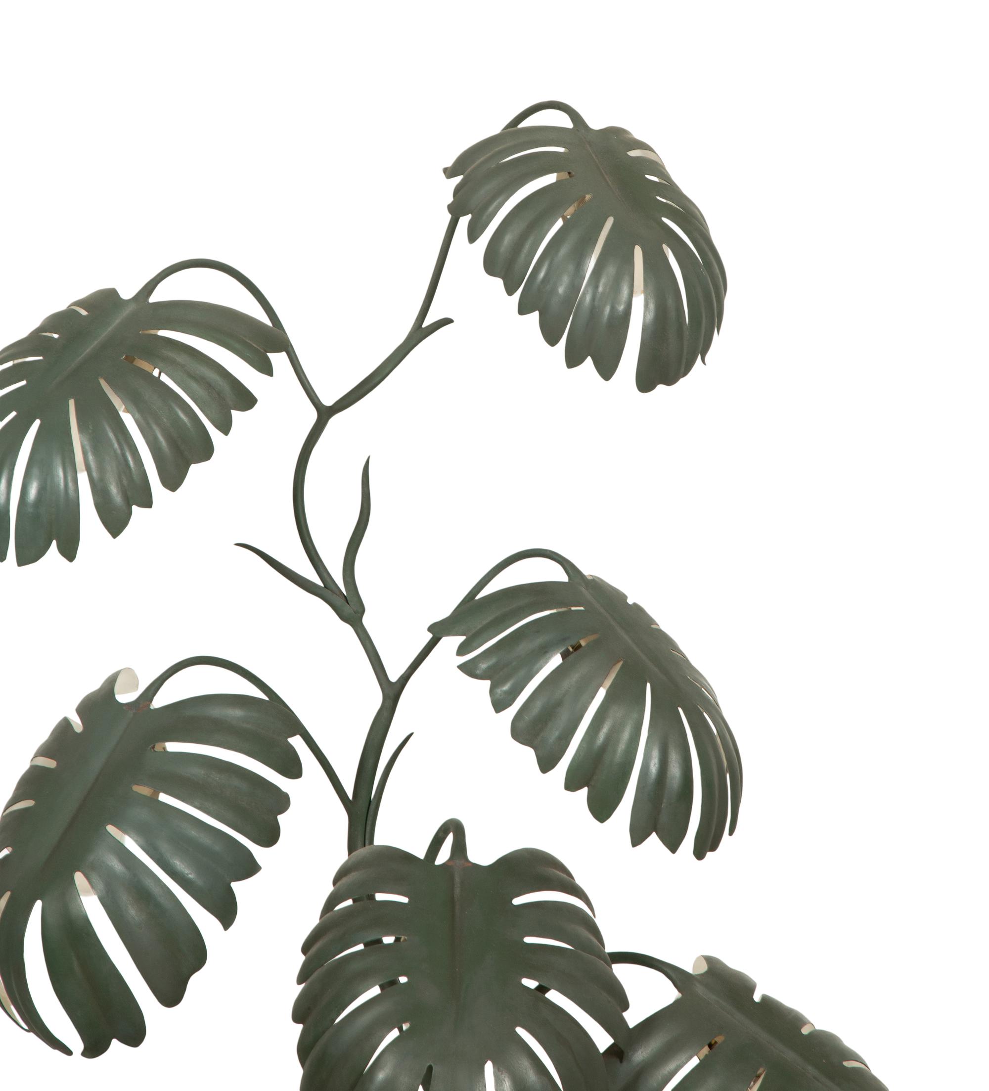A Green-Painted Metal Lamp Modeled as a Tropical Plant