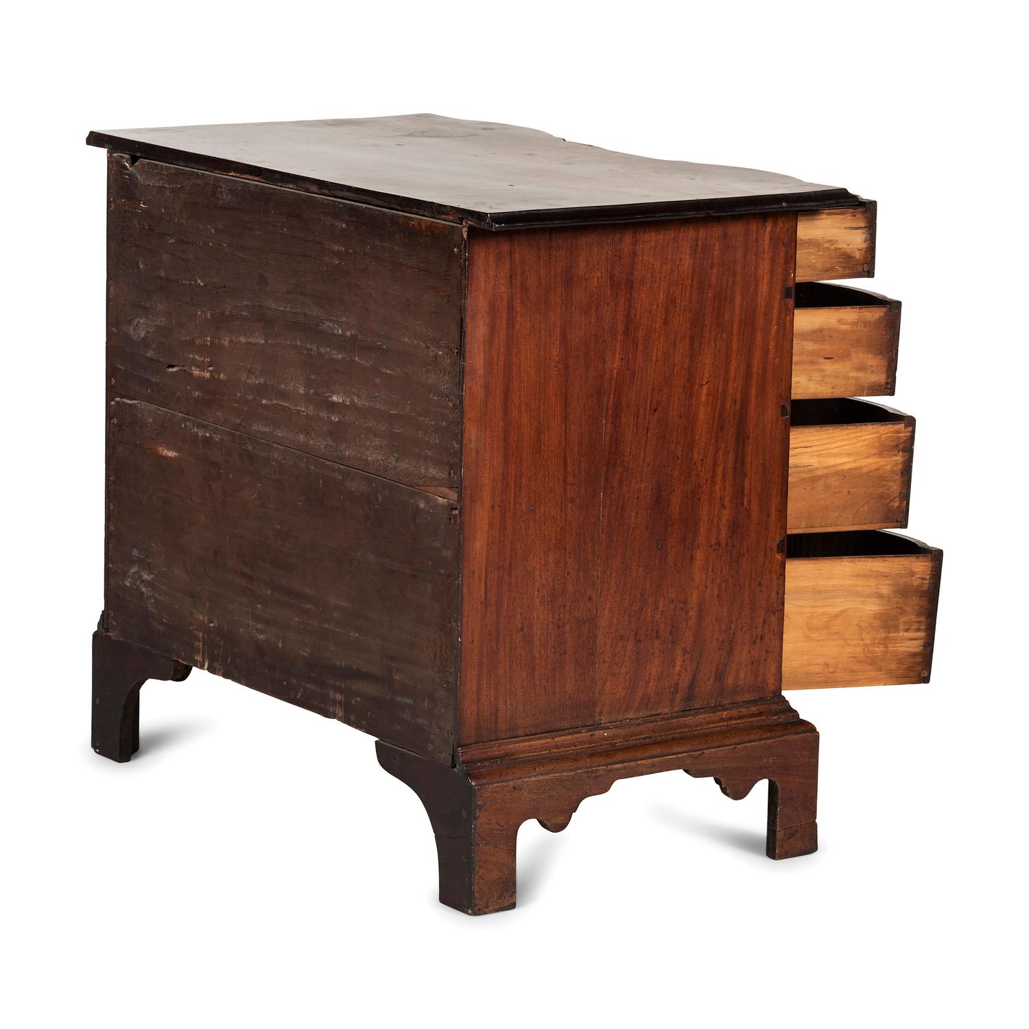 A Chippendale Figured Mahogany Block Front Chest of Drawers