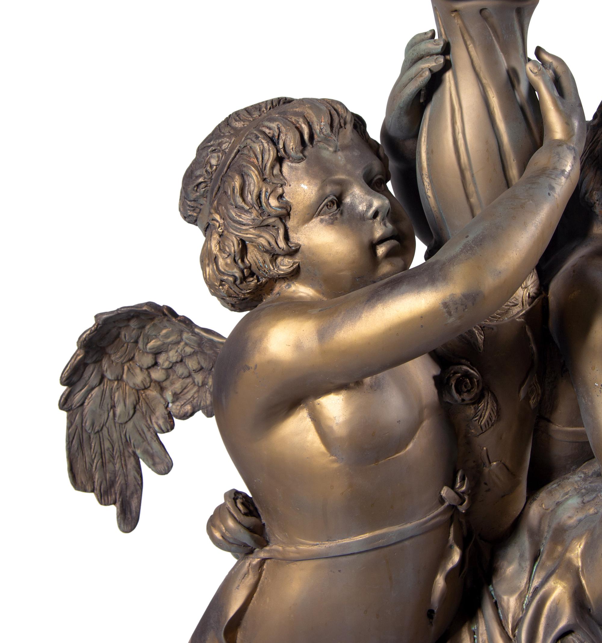 A Pair of Neoclassical Style Parcel Gilt Cast Metal Five-Light Torchères
