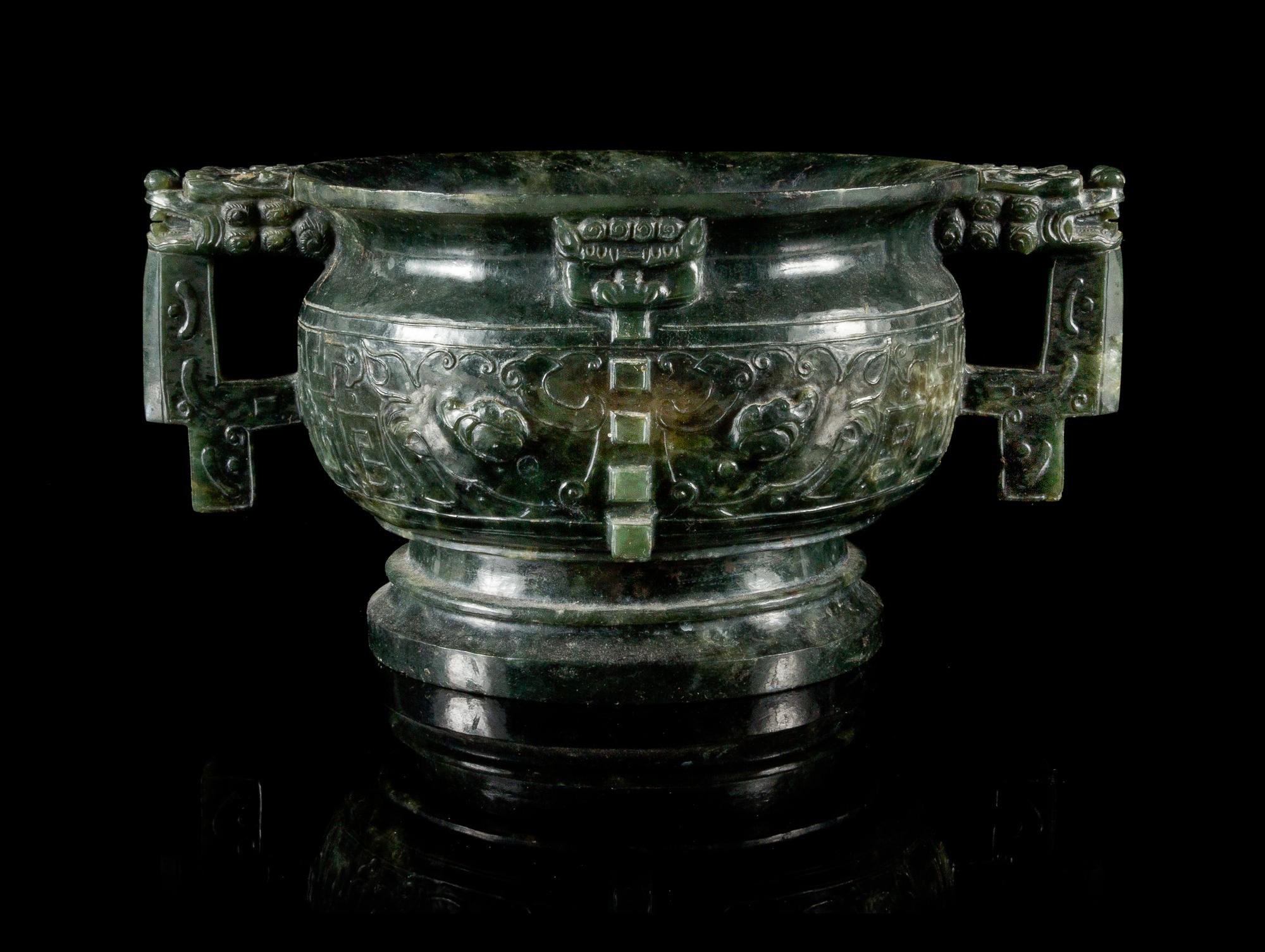 A Carved Spinach Jade Incense Burner — 19TH CENTURY
