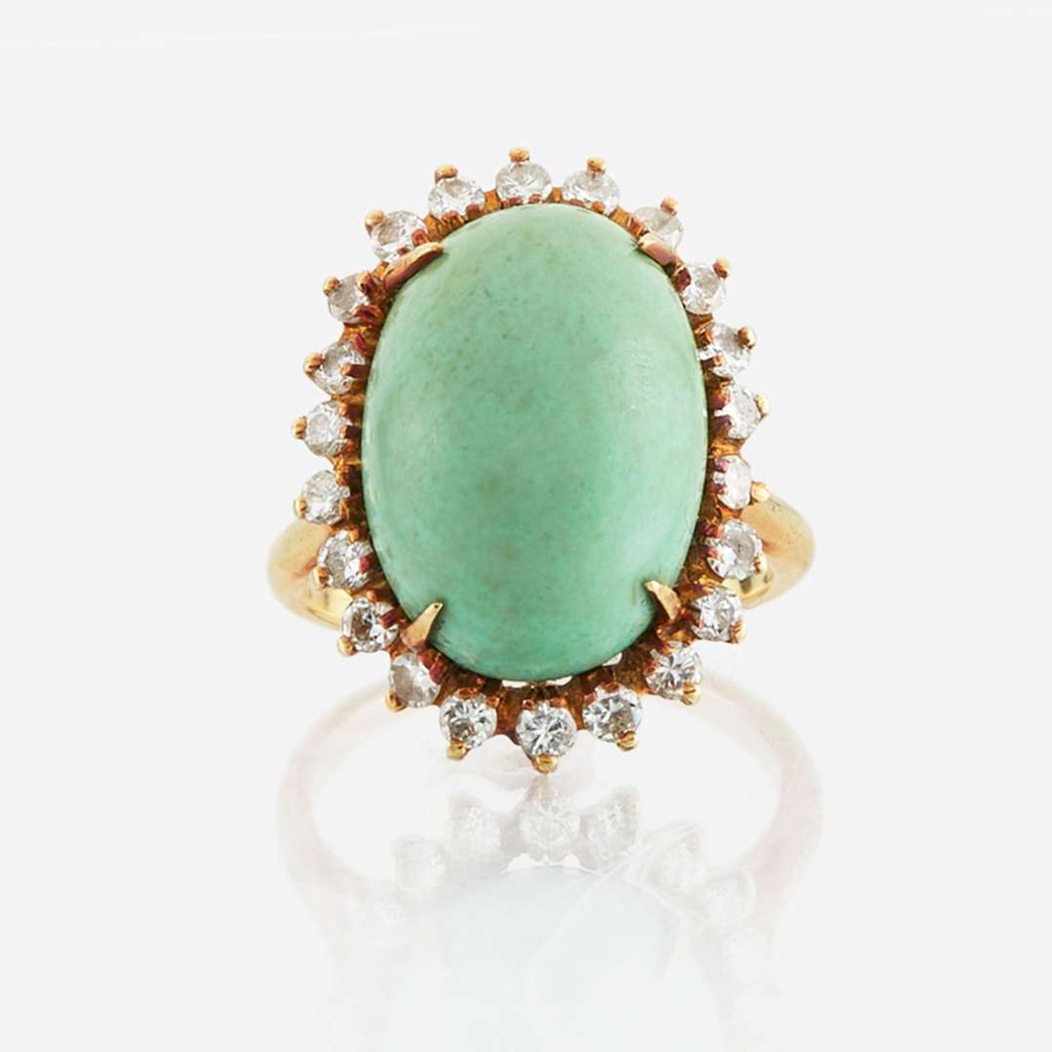 A turquoise, diamond, and gold ring