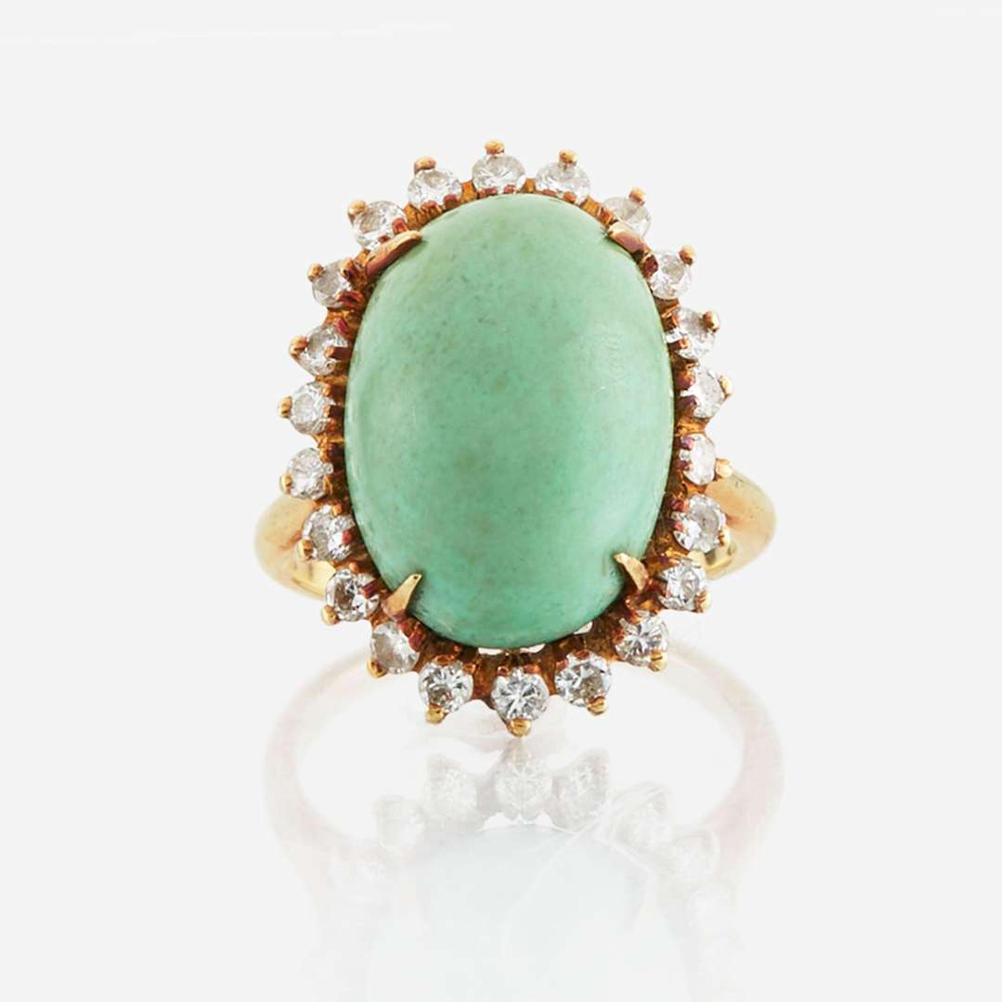 A turquoise, diamond, and gold ring