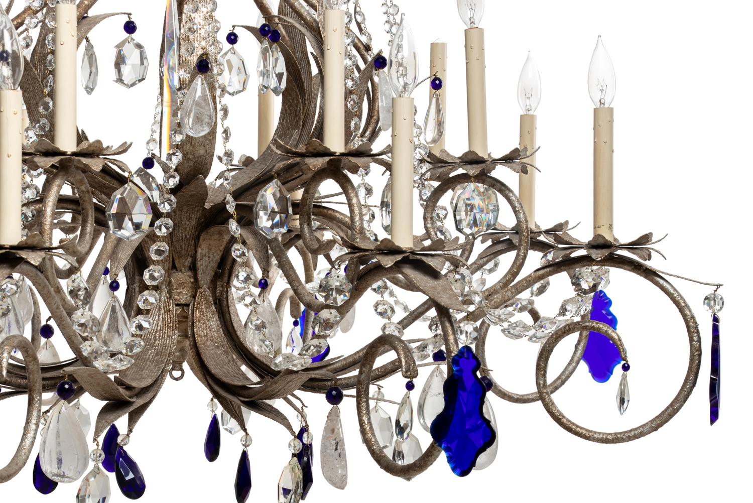 A Set of Three Large Metal and Glass Sixteen-Light Chandeliers