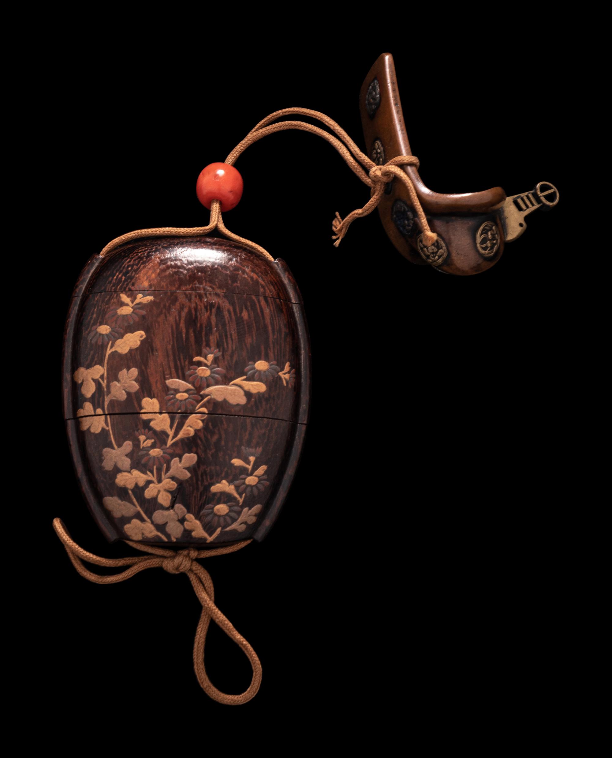 A Japanese Gold and Brown Lacquered Wood Two-Case Inro