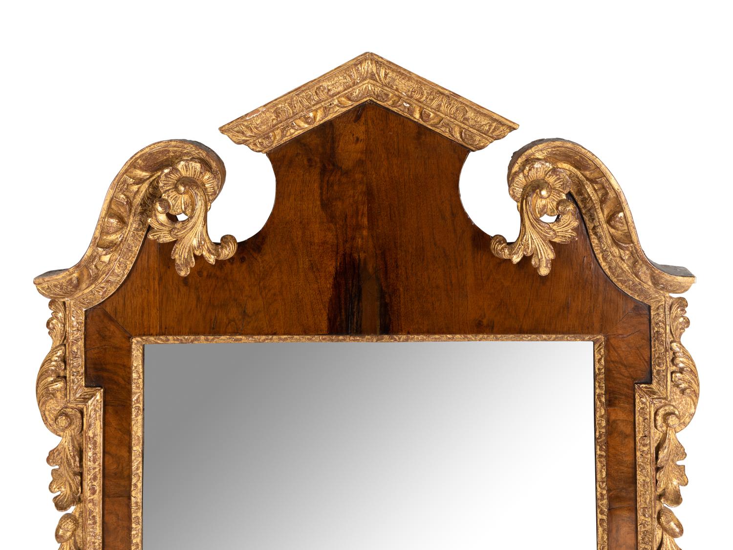 A George II Walnut and Parcel Gilt Mirror