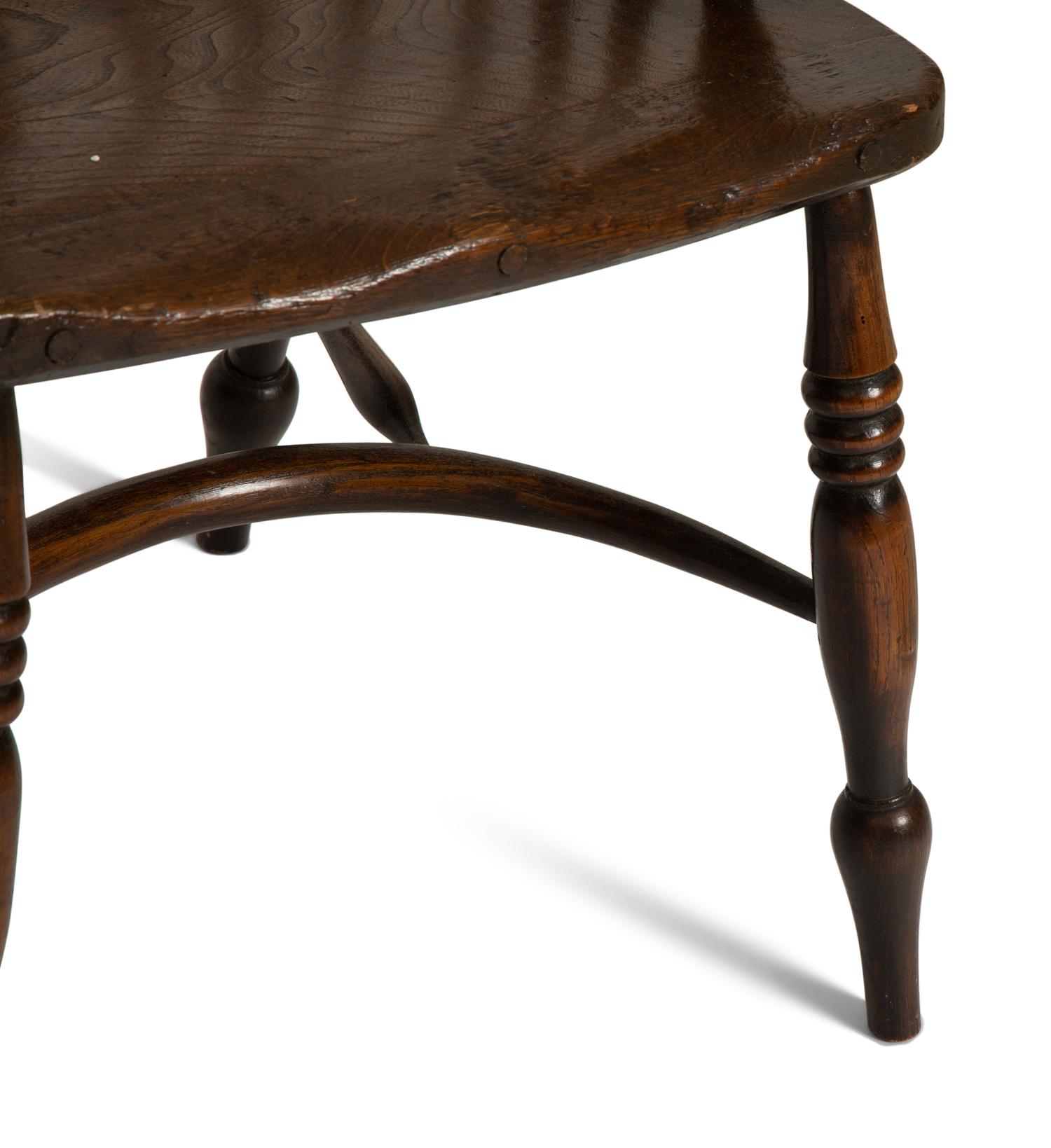 A Set of Eight English Oak Windsor Armchairs