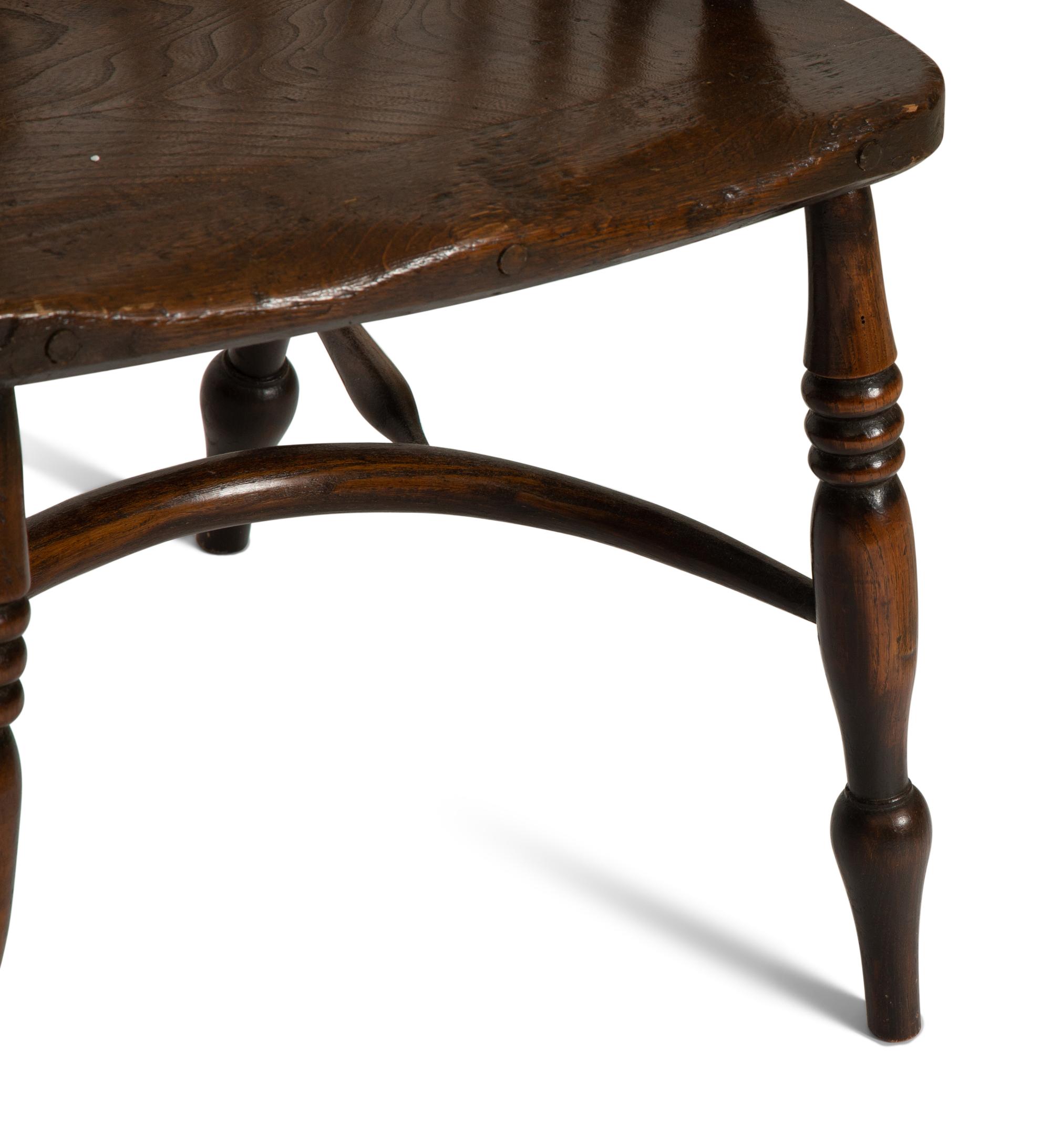 A Set of Eight English Oak Windsor Armchairs