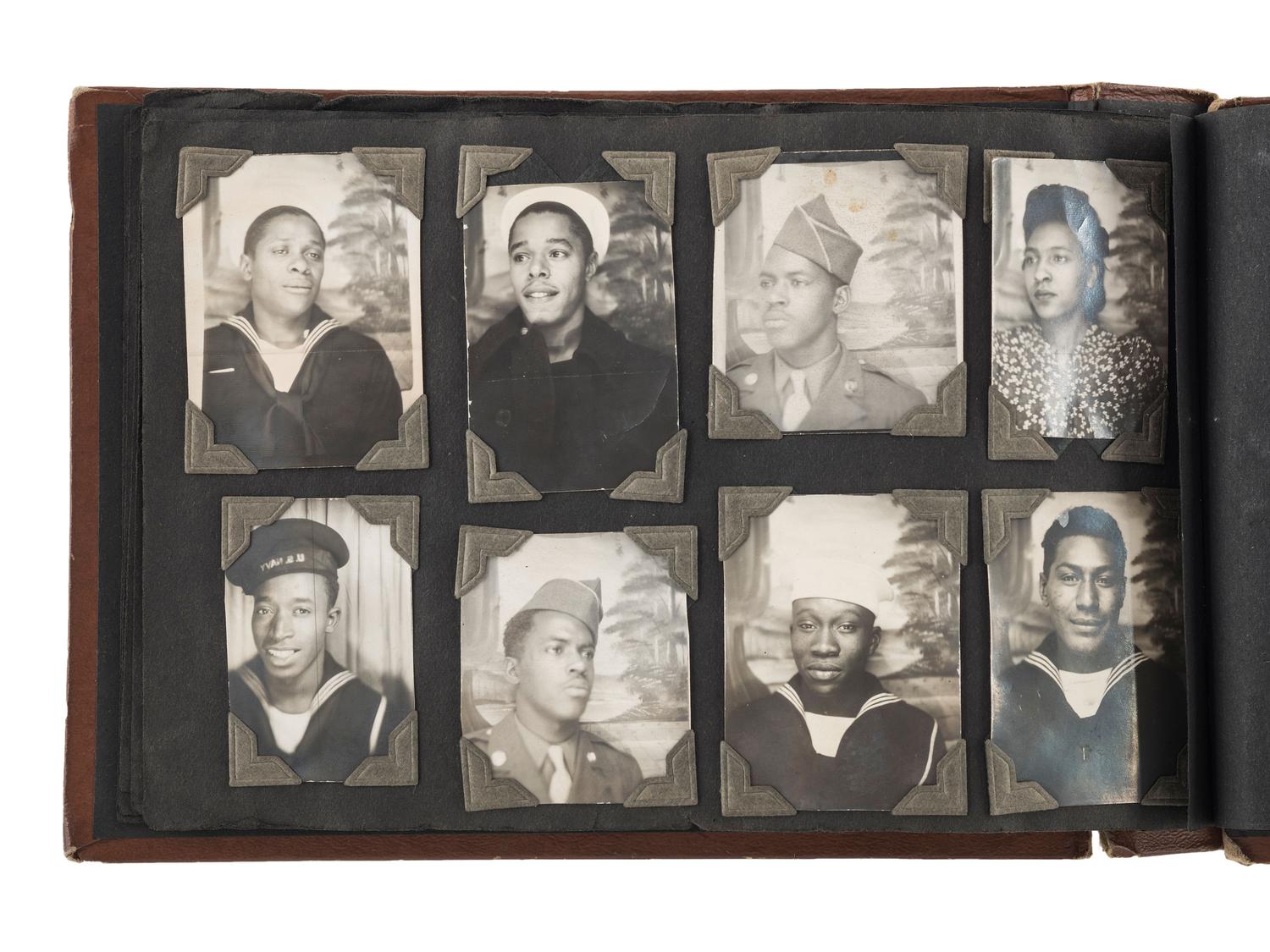 [WORLD WAR II]. A collection of over 100 snapshots of African American soldiers, sweethearts, and family. Ca 1940s-1950s.