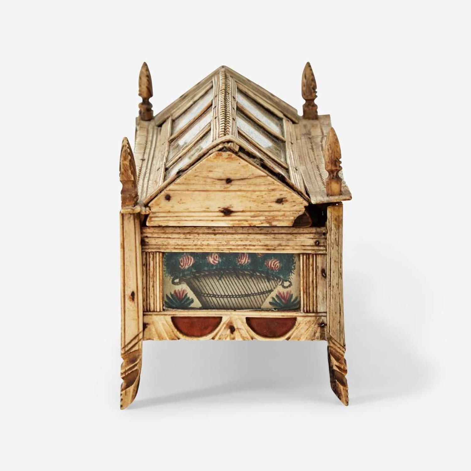 A Prisoner-of-War carved and paint-decorated bone game box circa 1815