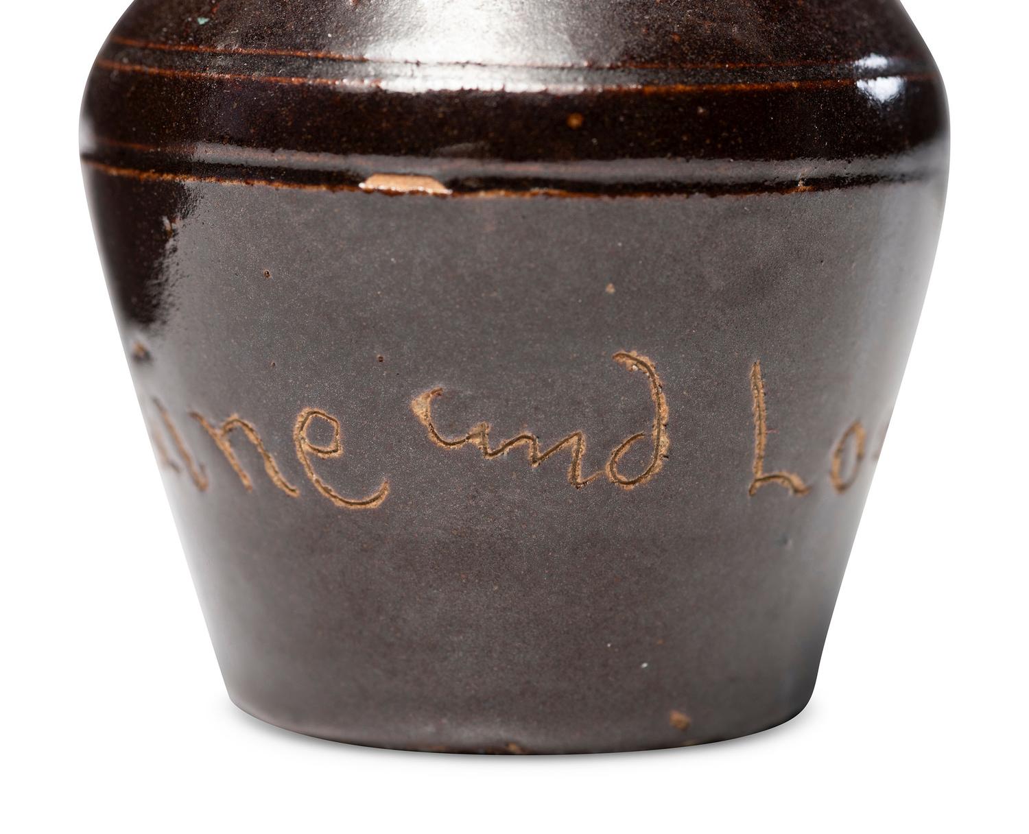 A Miniature Albany Slip-Glazed Political Campaign Favor Pitcher