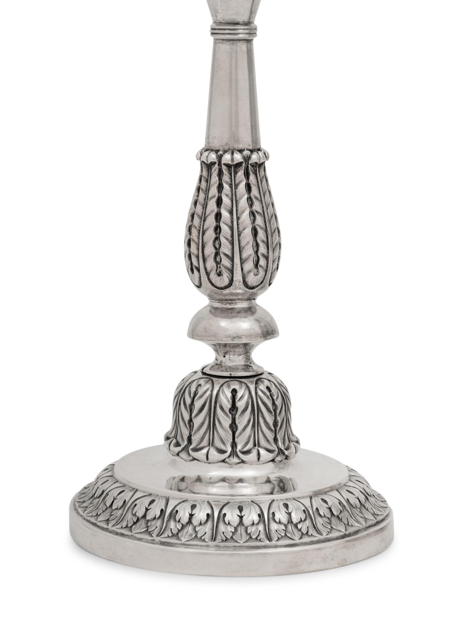 A Pair of Russian Silver Candlesticks
