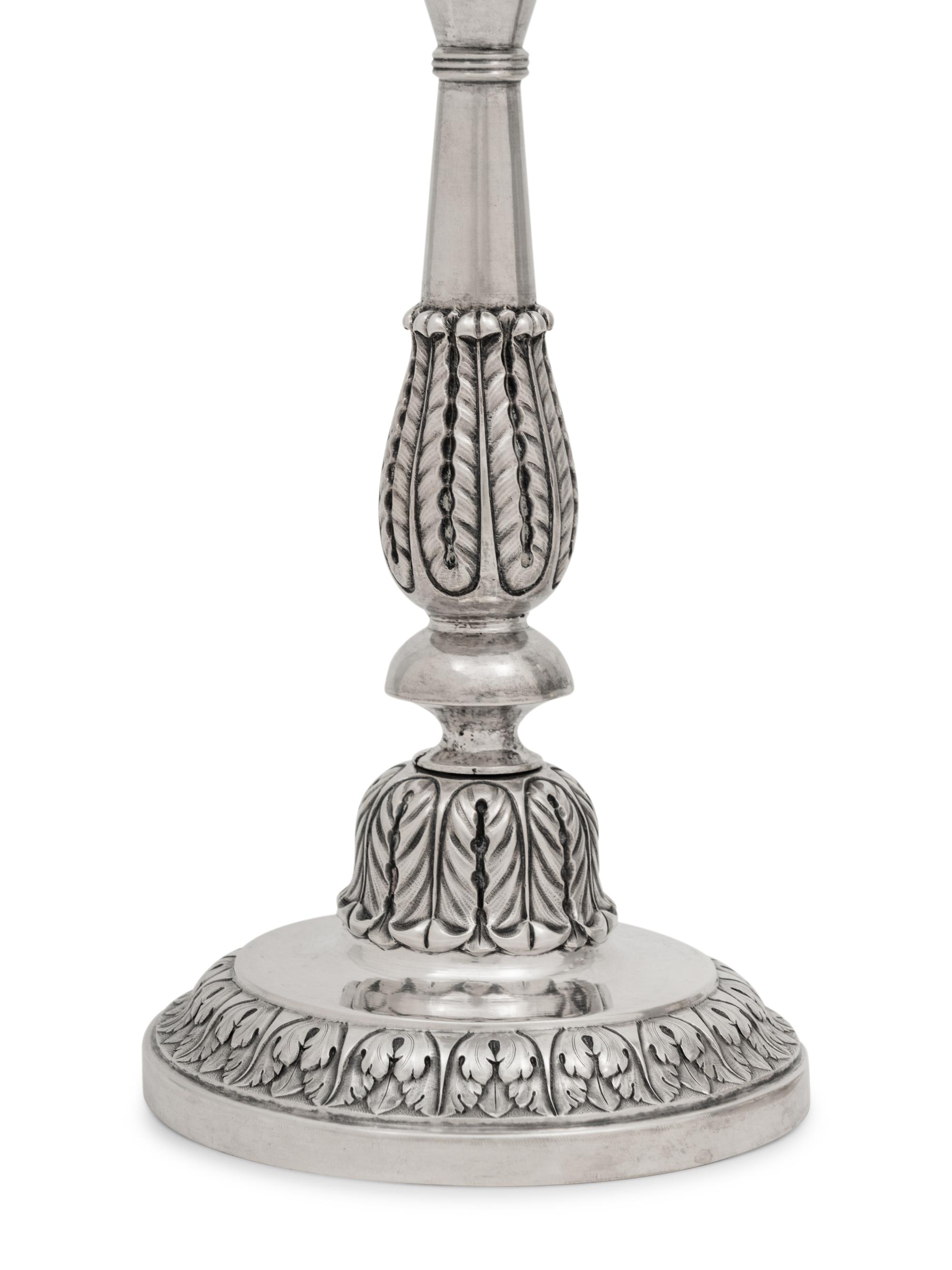A Pair of Russian Silver Candlesticks