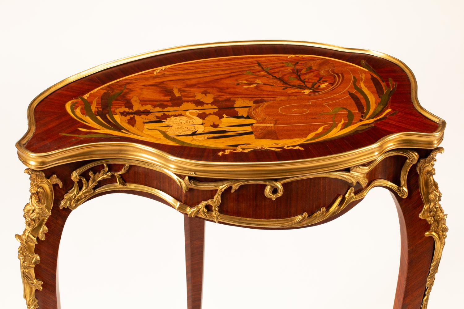 A Louis XV Style Marquetry Cartouche Table