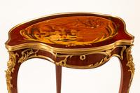 A Louis XV Style Marquetry Cartouche Table