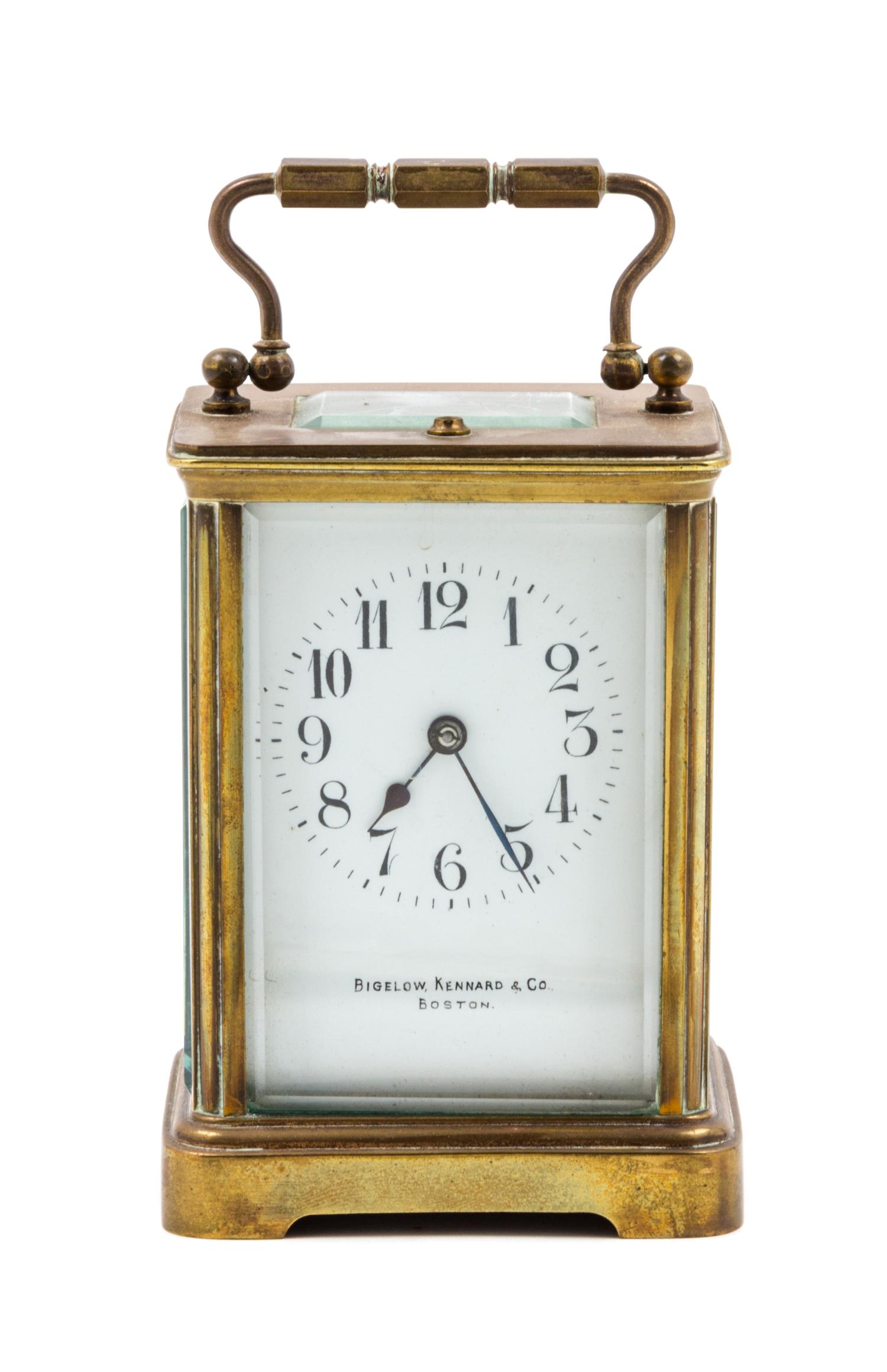A French Gilt Bronze Carriage Clock Height 5 1/8 inches. — RETAILED BY BIGELOW, KENNARD & CO., BOSTON