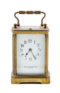 A French Gilt Bronze Carriage Clock Height 5 1/8 inches. — RETAILED BY BIGELOW, KENNARD & CO., BOSTON