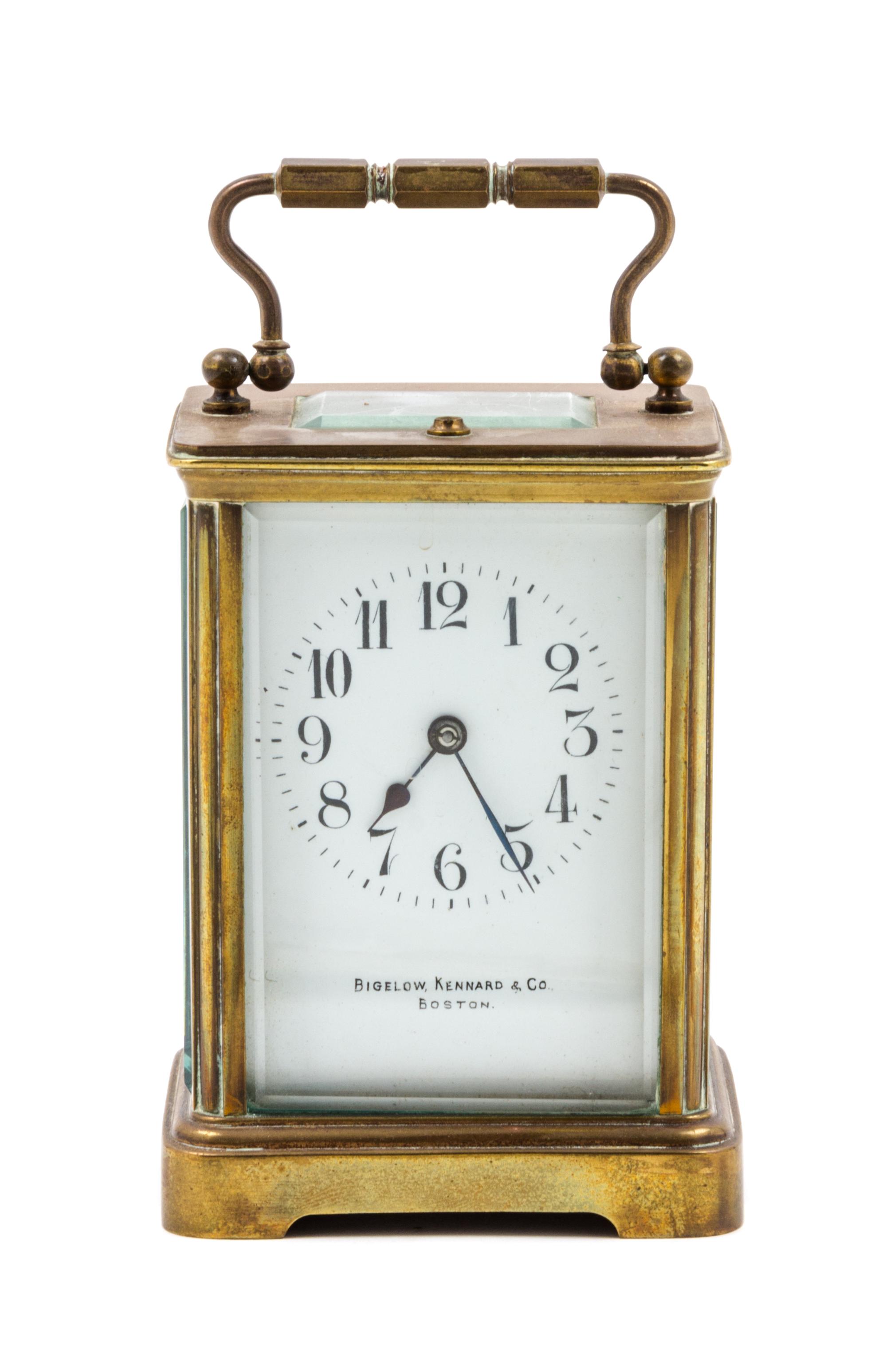 A French Gilt Bronze Carriage Clock Height 5 1/8 inches. — RETAILED BY BIGELOW, KENNARD & CO., BOSTON