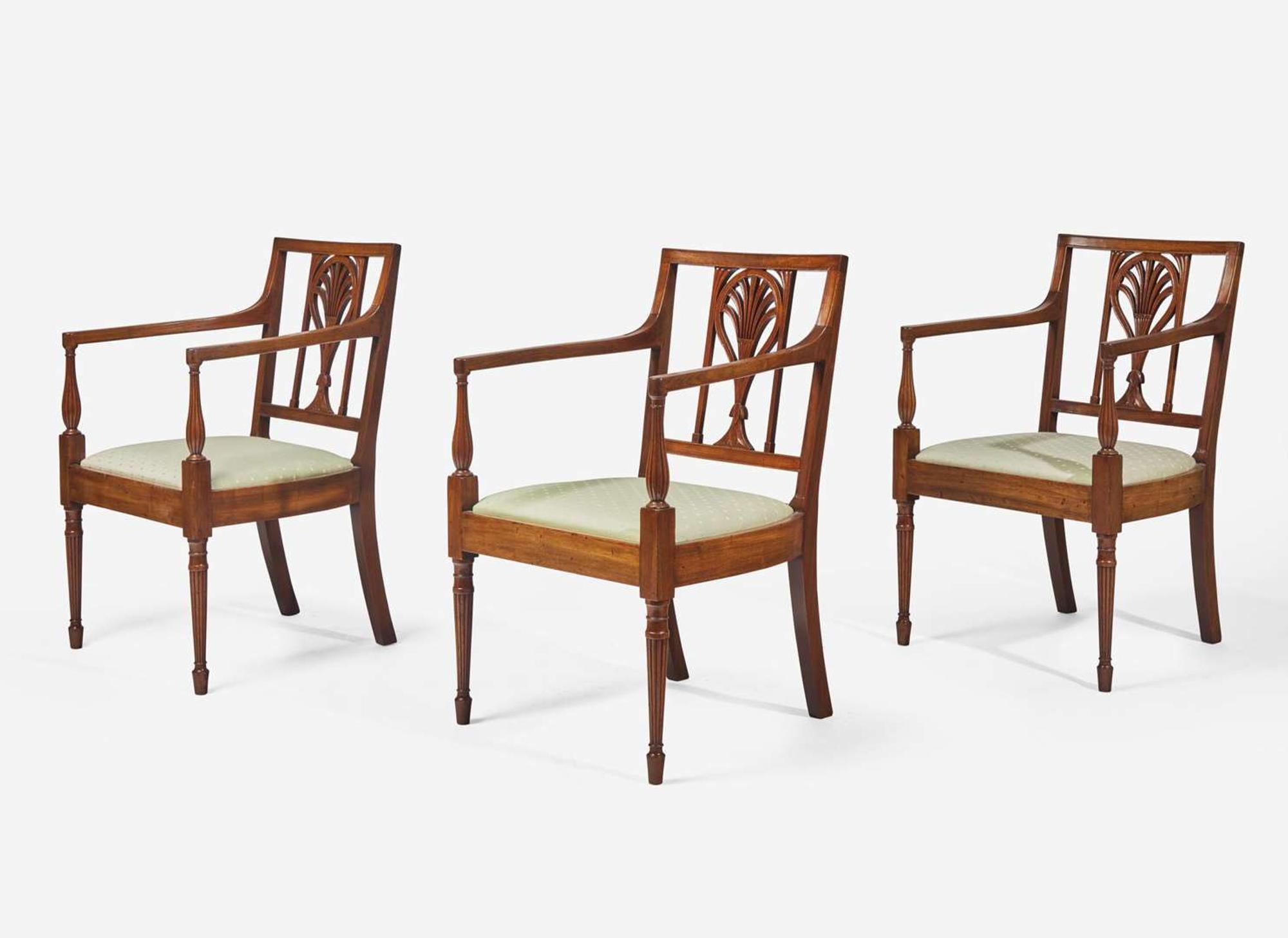 A group of three Federal mahogany racquet-back armchairs, Philadelphia, PA, circa 1790