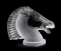 A Lalique Molded and Frosted Glass Radiator Cap, Height 4 7/8 inches.