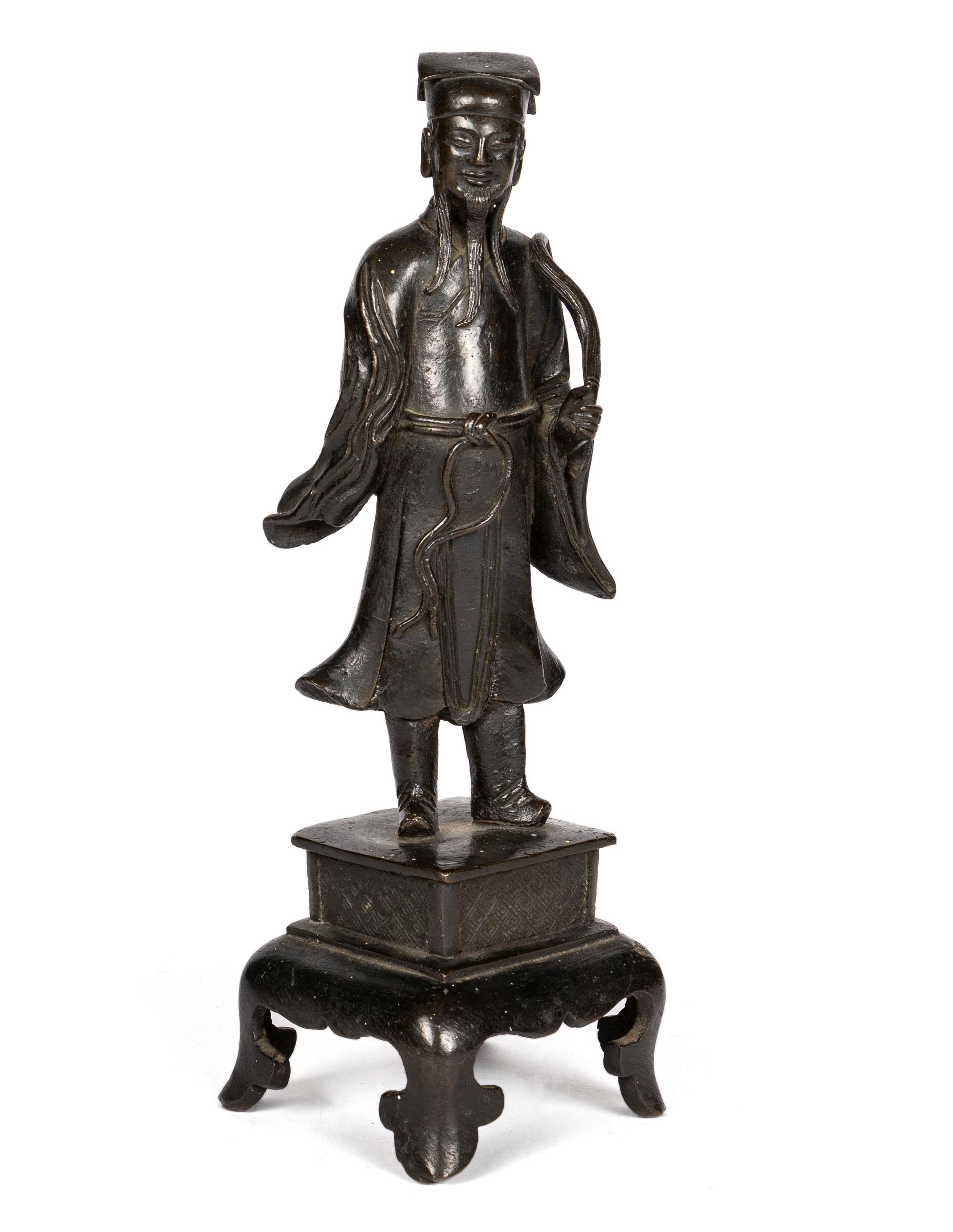 A Chinese Bronze Figure of a Daoist Immortal