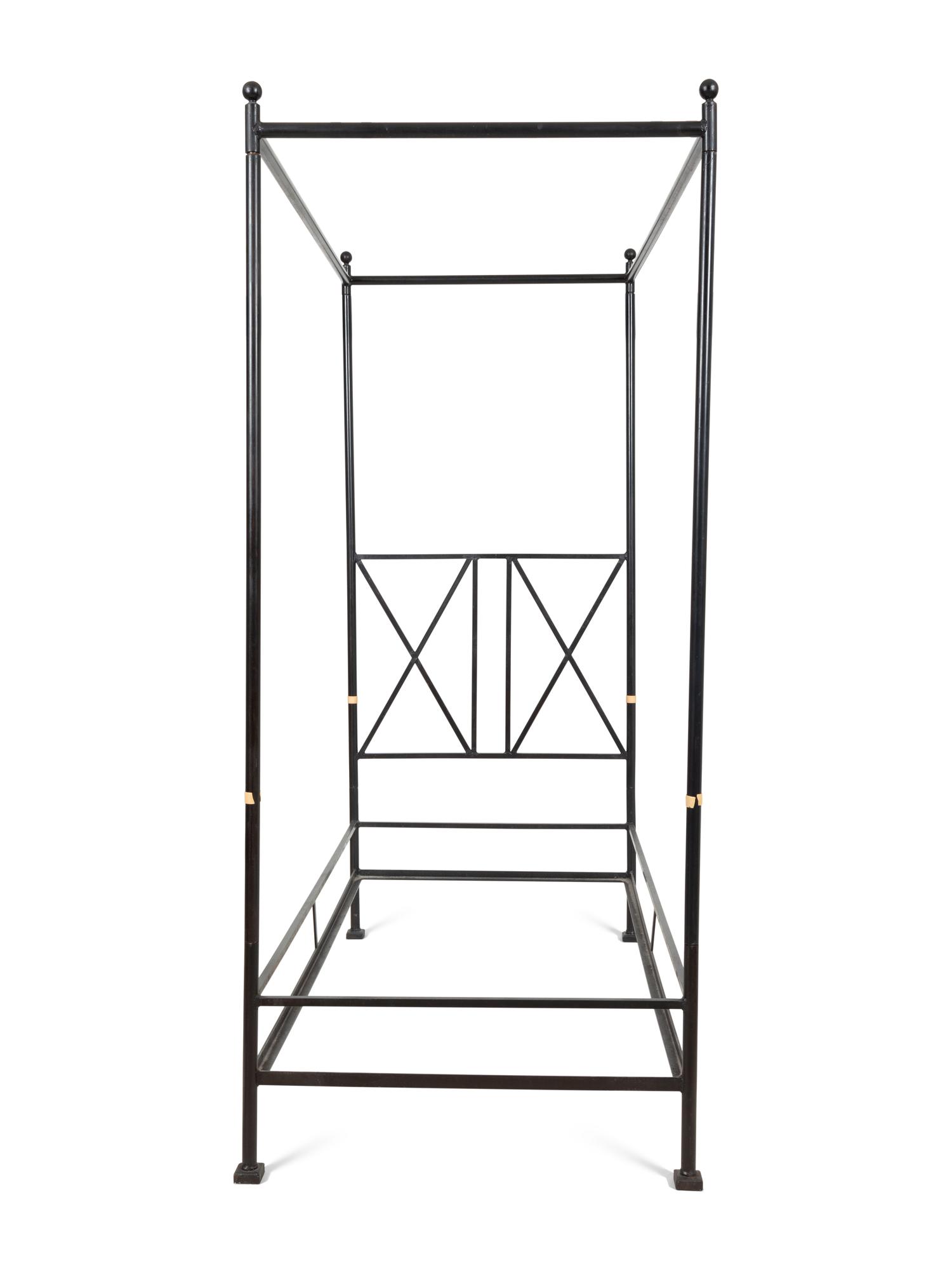 A Pair of Bronzed Metal Twin Four Poster Beds with Bed Hangings
