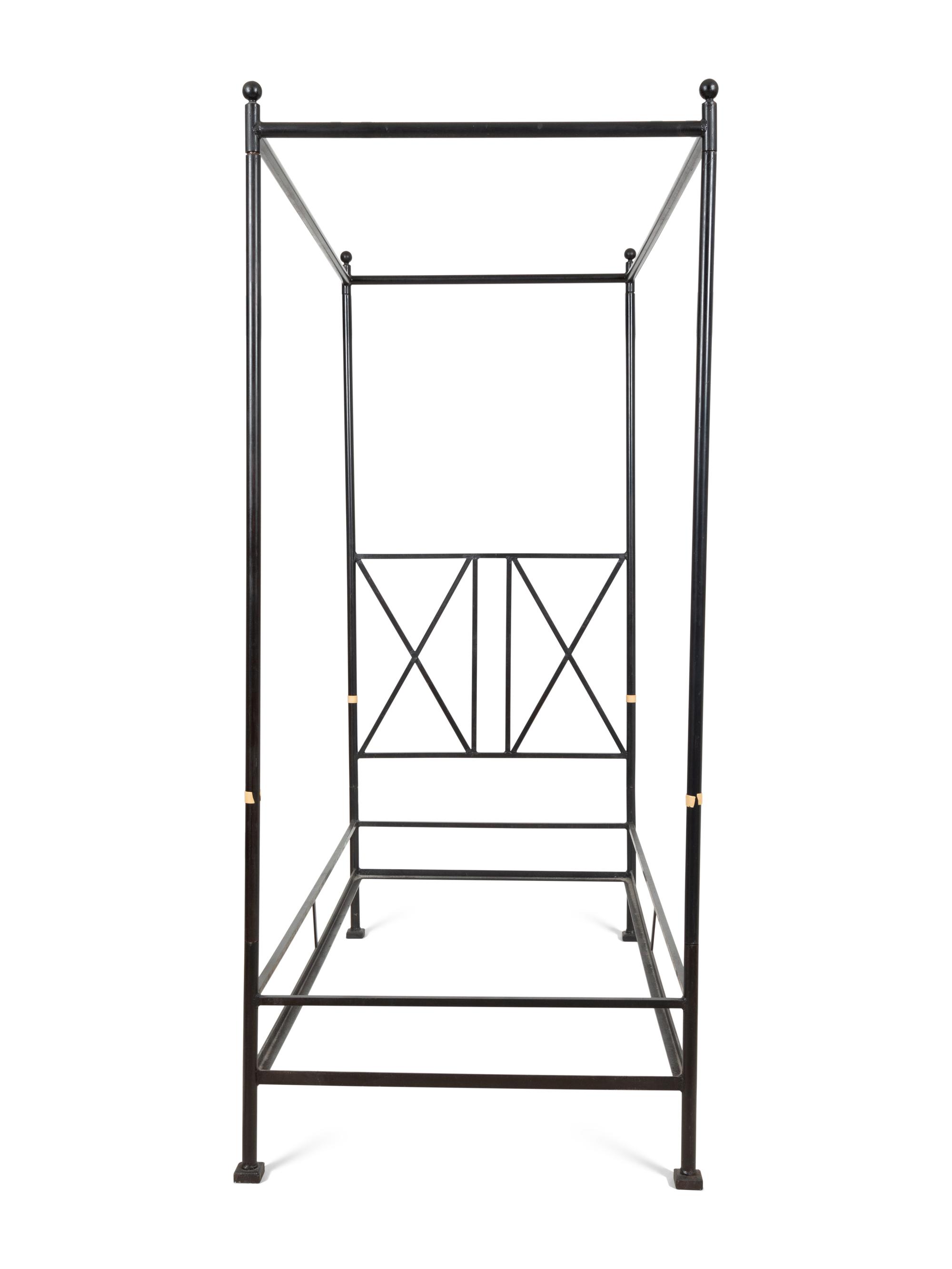A Pair of Bronzed Metal Twin Four Poster Beds with Bed Hangings