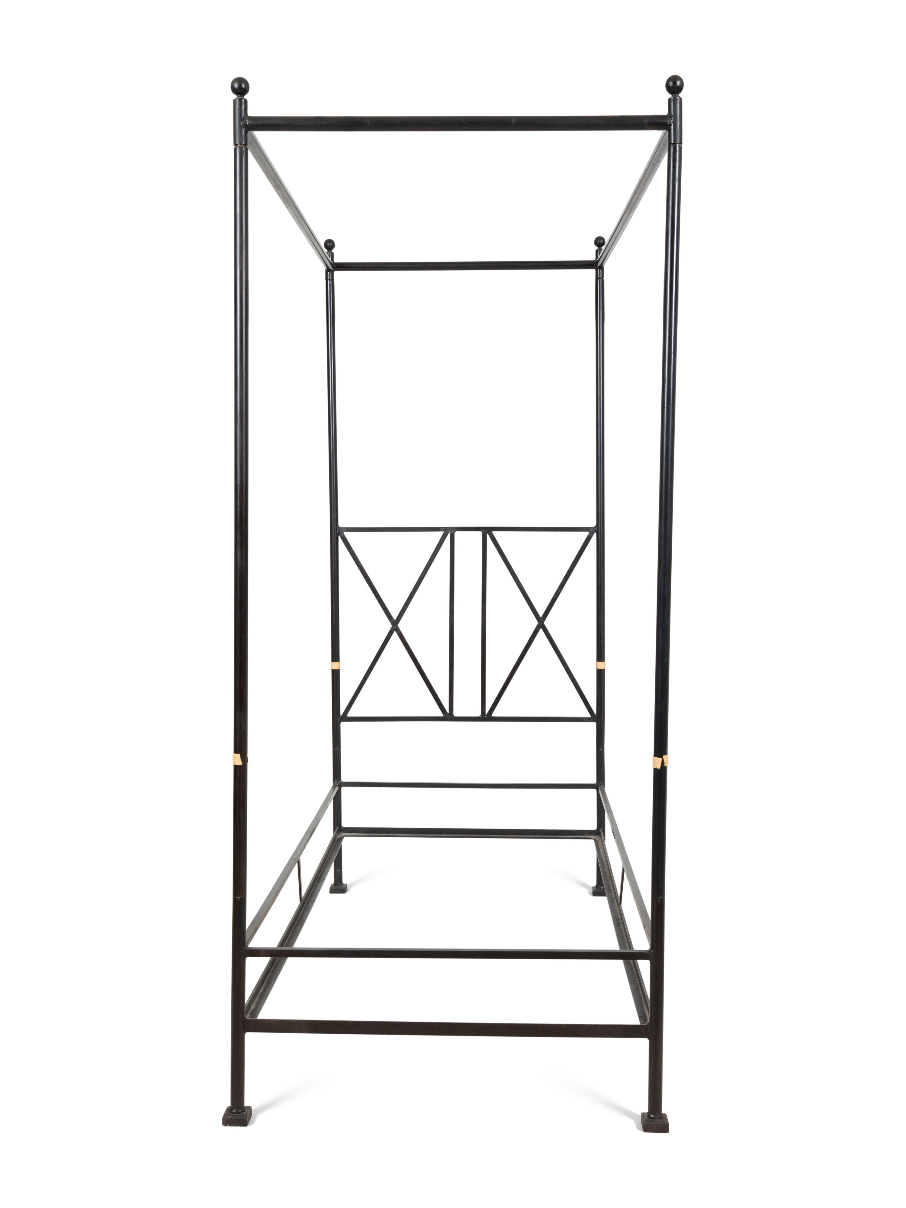 A Pair of Bronzed Metal Twin Four Poster Beds with Bed Hangings