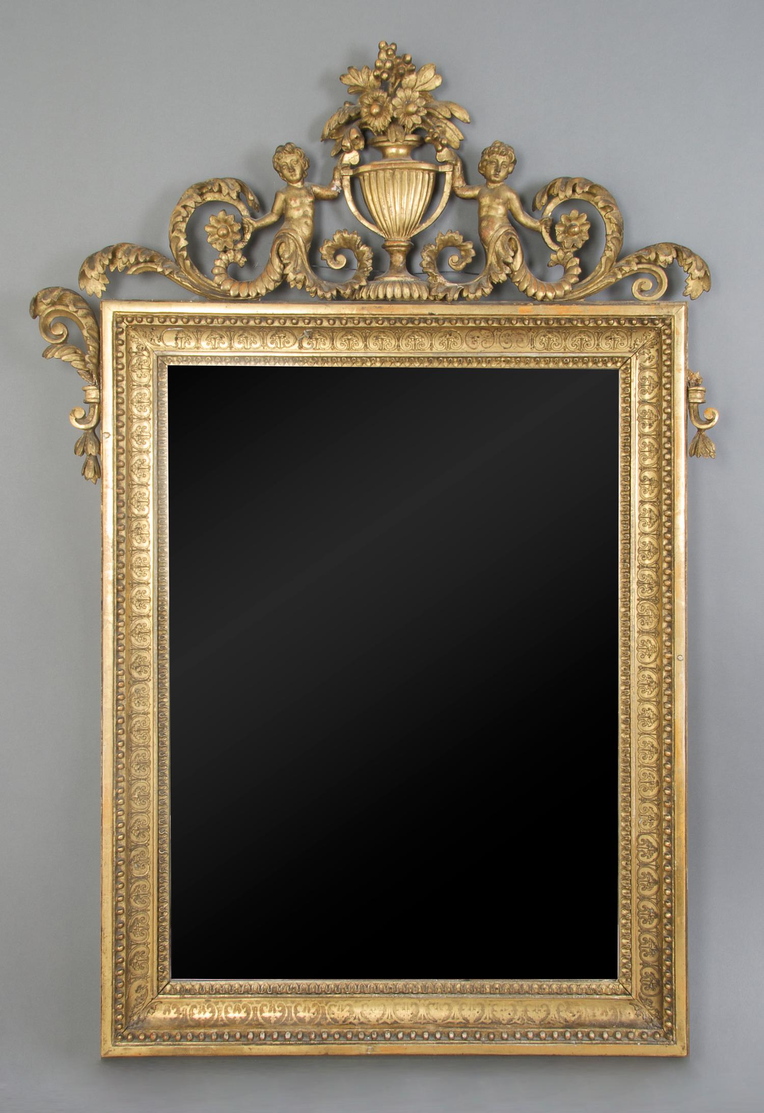 A Continental Giltwood Mirror, Height 49 x width 31 inches.