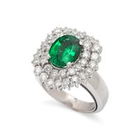 TSAVORITE GARNET AND DIAMOND RING