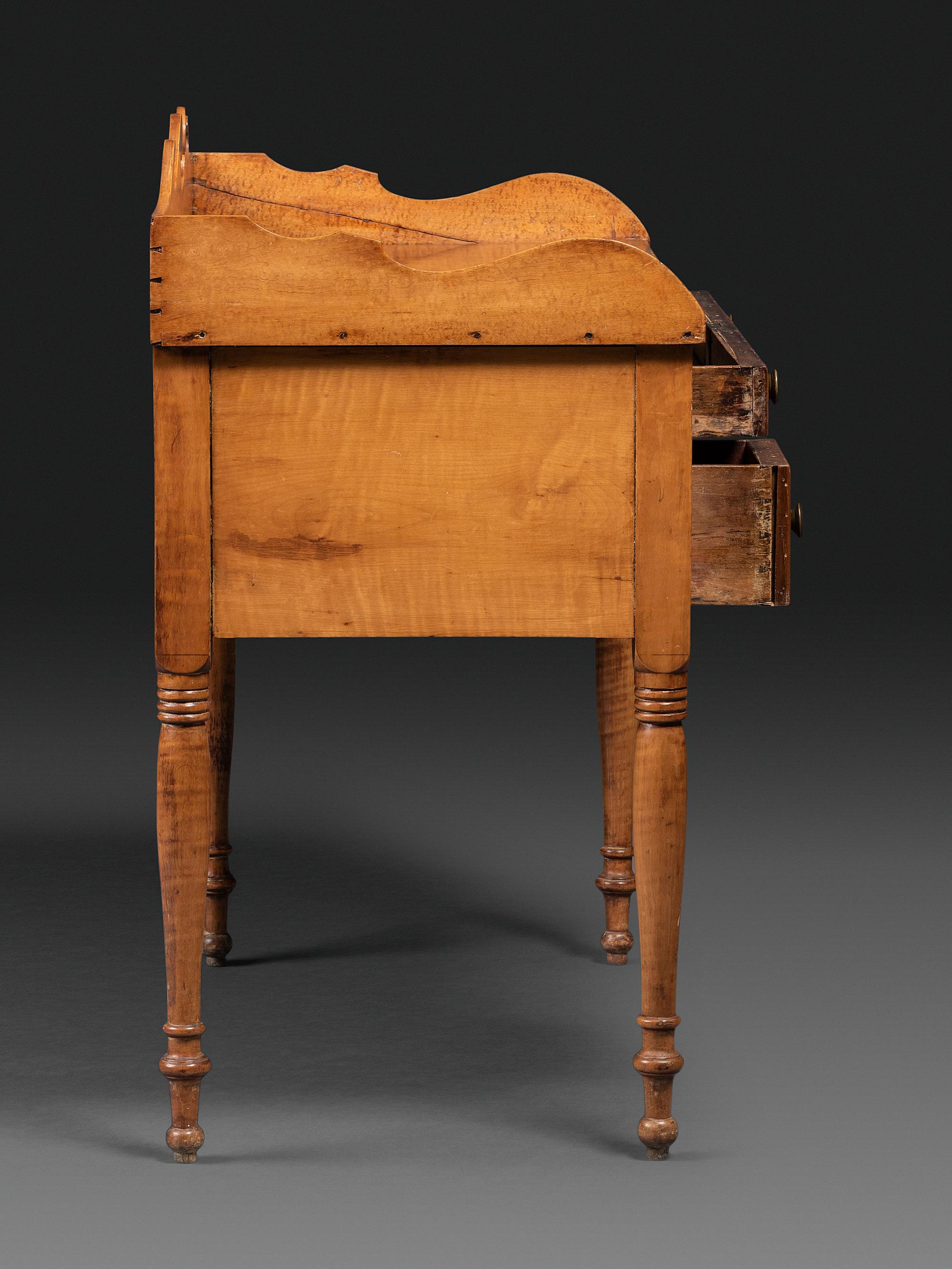 A Classical Bird’s Eye and Tiger Maple Writing Desk