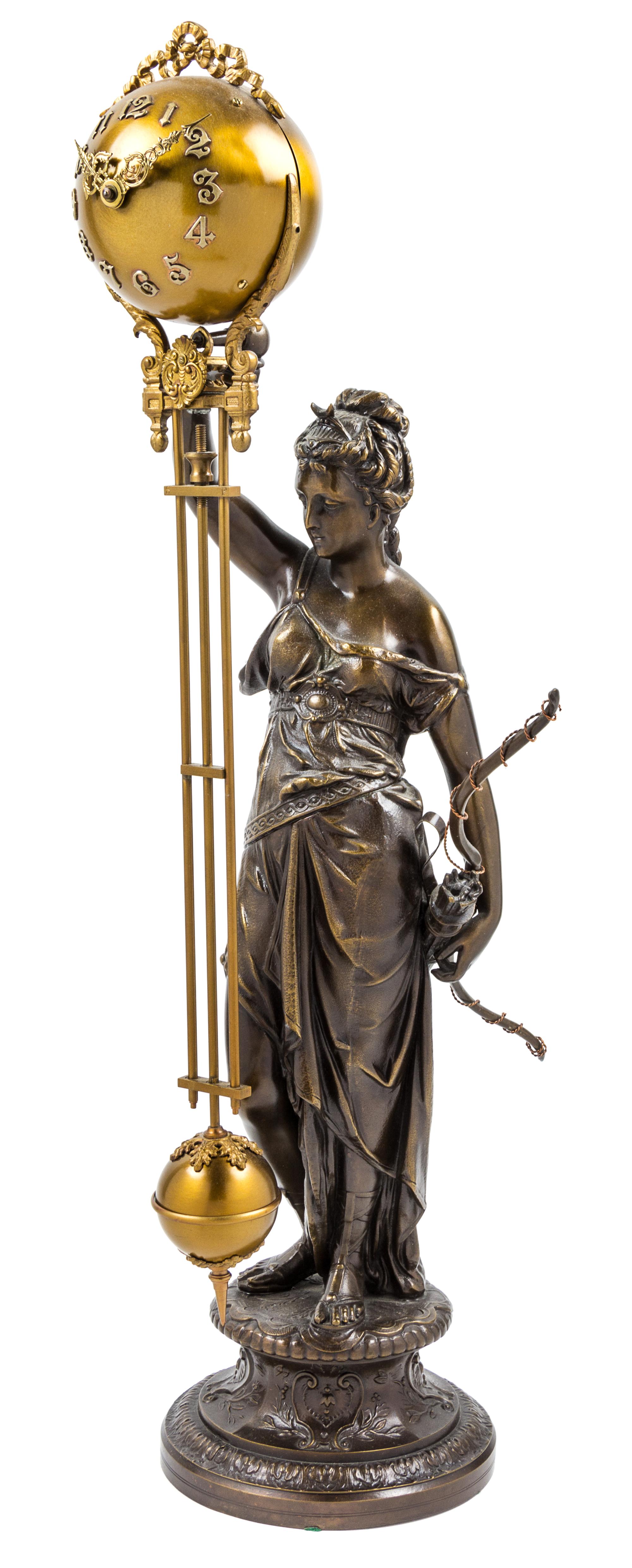 A Cast Metal Figural Pendulum Clock Height 28 inches. — ANSONIA CLOCK CO.