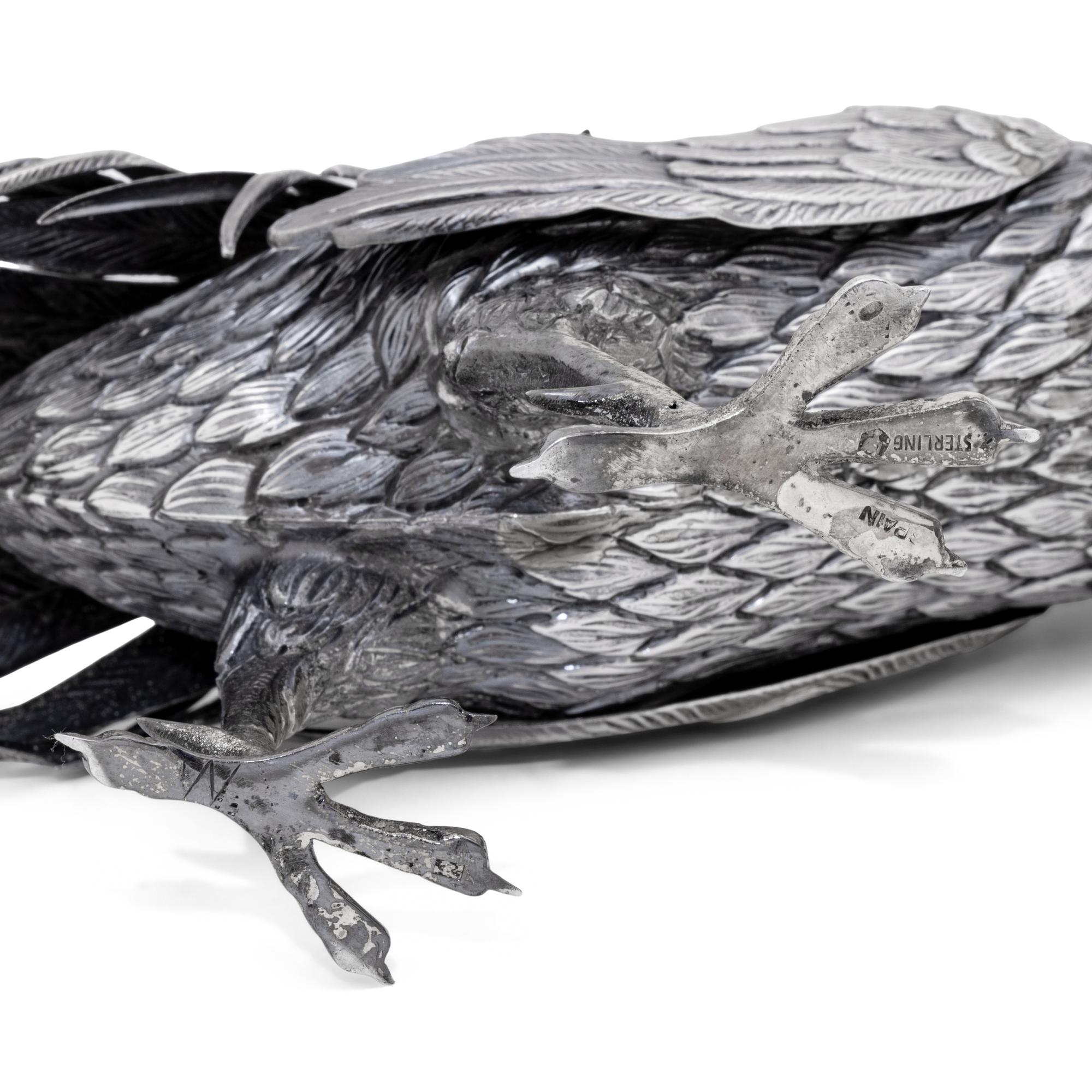 A Pair of Spanish Silver Pheasant Table Ornaments