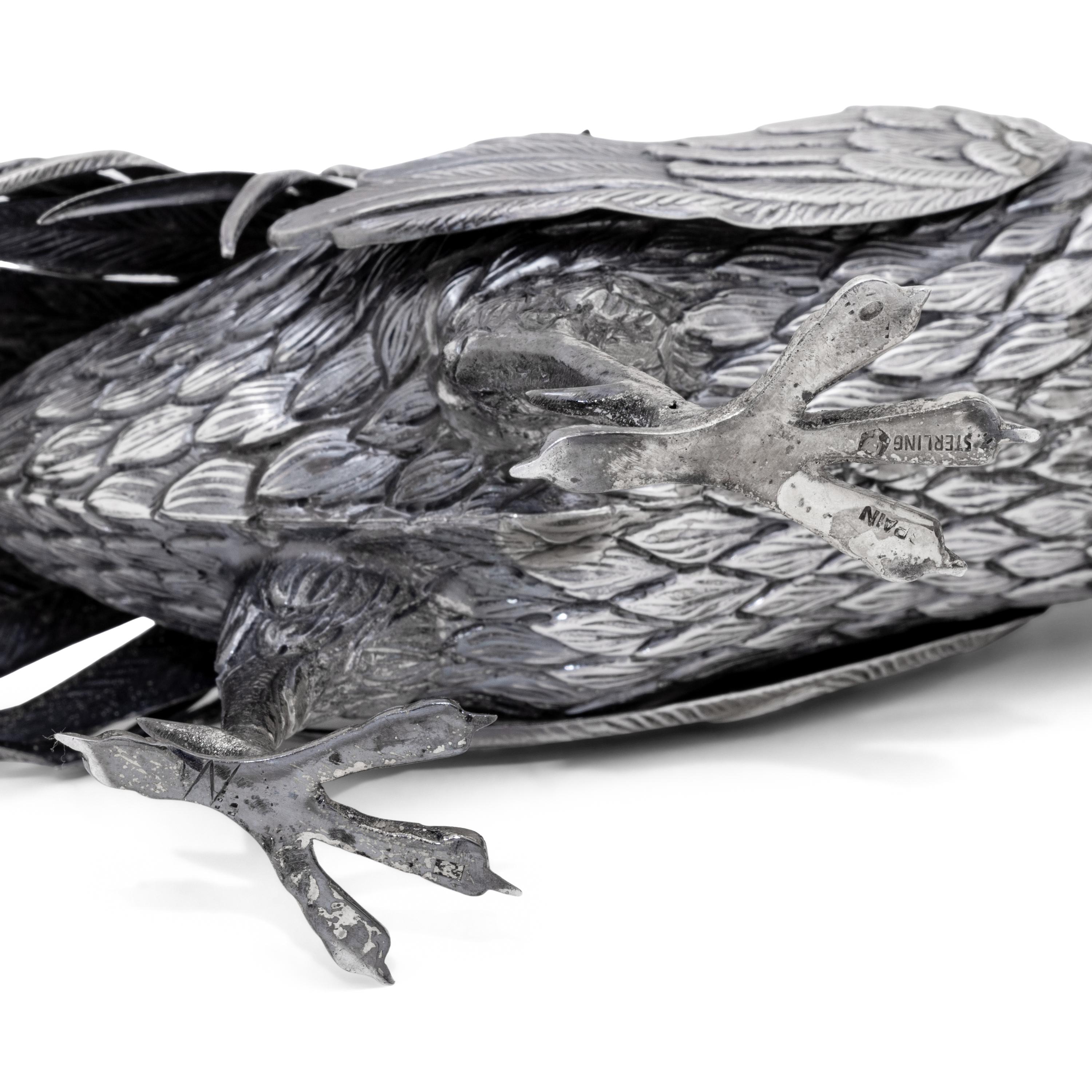 A Pair of Spanish Silver Pheasant Table Ornaments