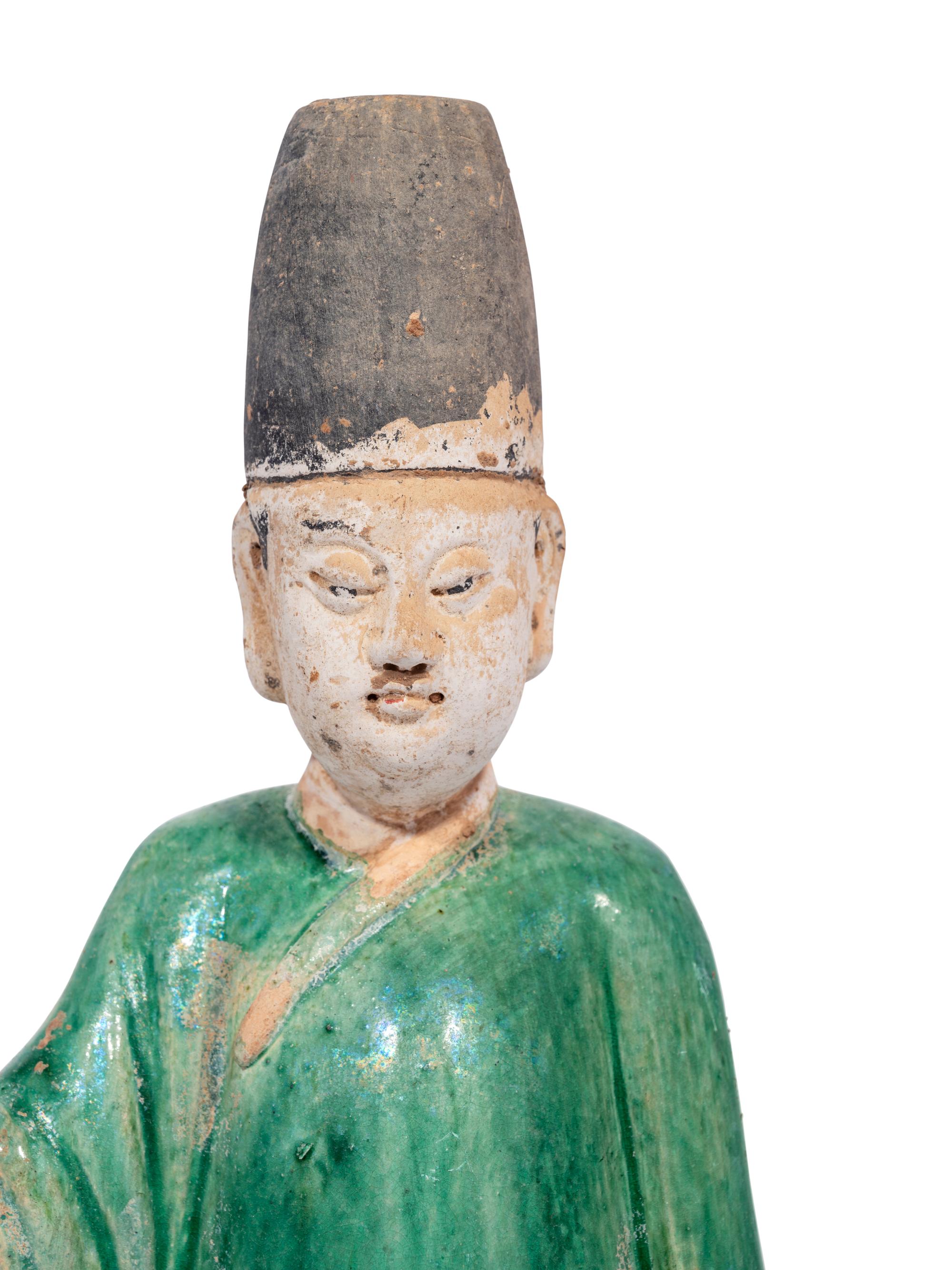 Two Chinese Green Glazed Pottery Figures of Attendants