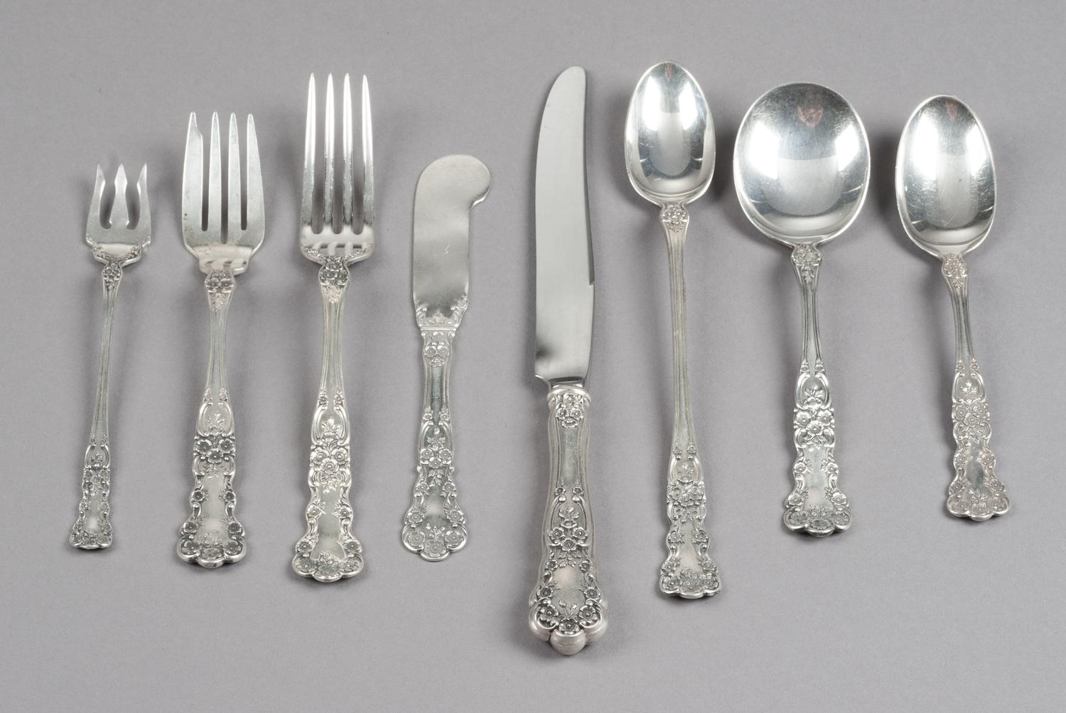 An American Silver Flatware Service, Gorham Mfg. Co., Providence, RI, Buttercup pattern, comprising: 12 luncheon knives 12 luncheon for