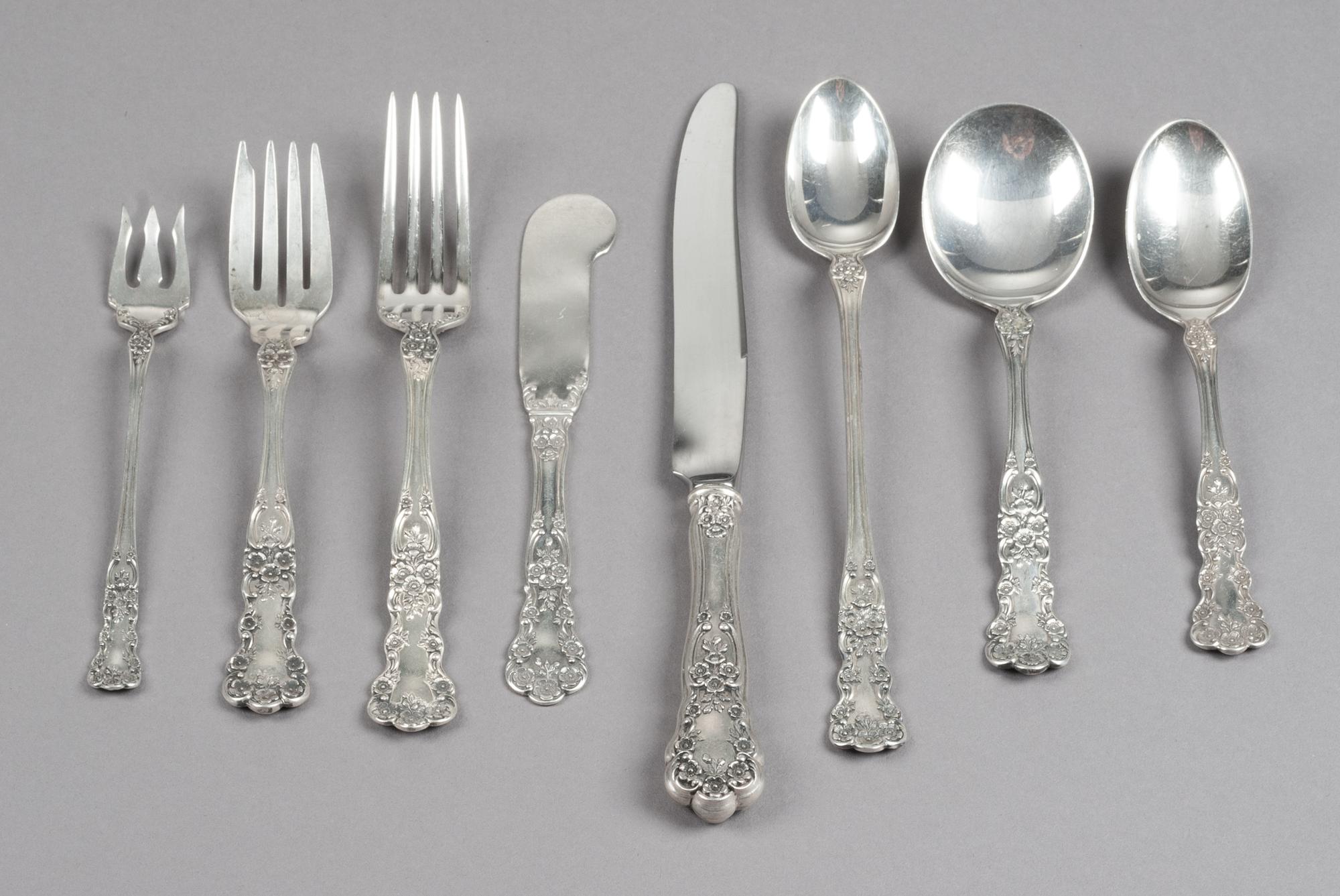 An American Silver Flatware Service, Gorham Mfg. Co., Providence, RI, Buttercup pattern, comprising: 12 luncheon knives 12 luncheon for