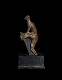 An Egyptian Bronze Handle with a Cat