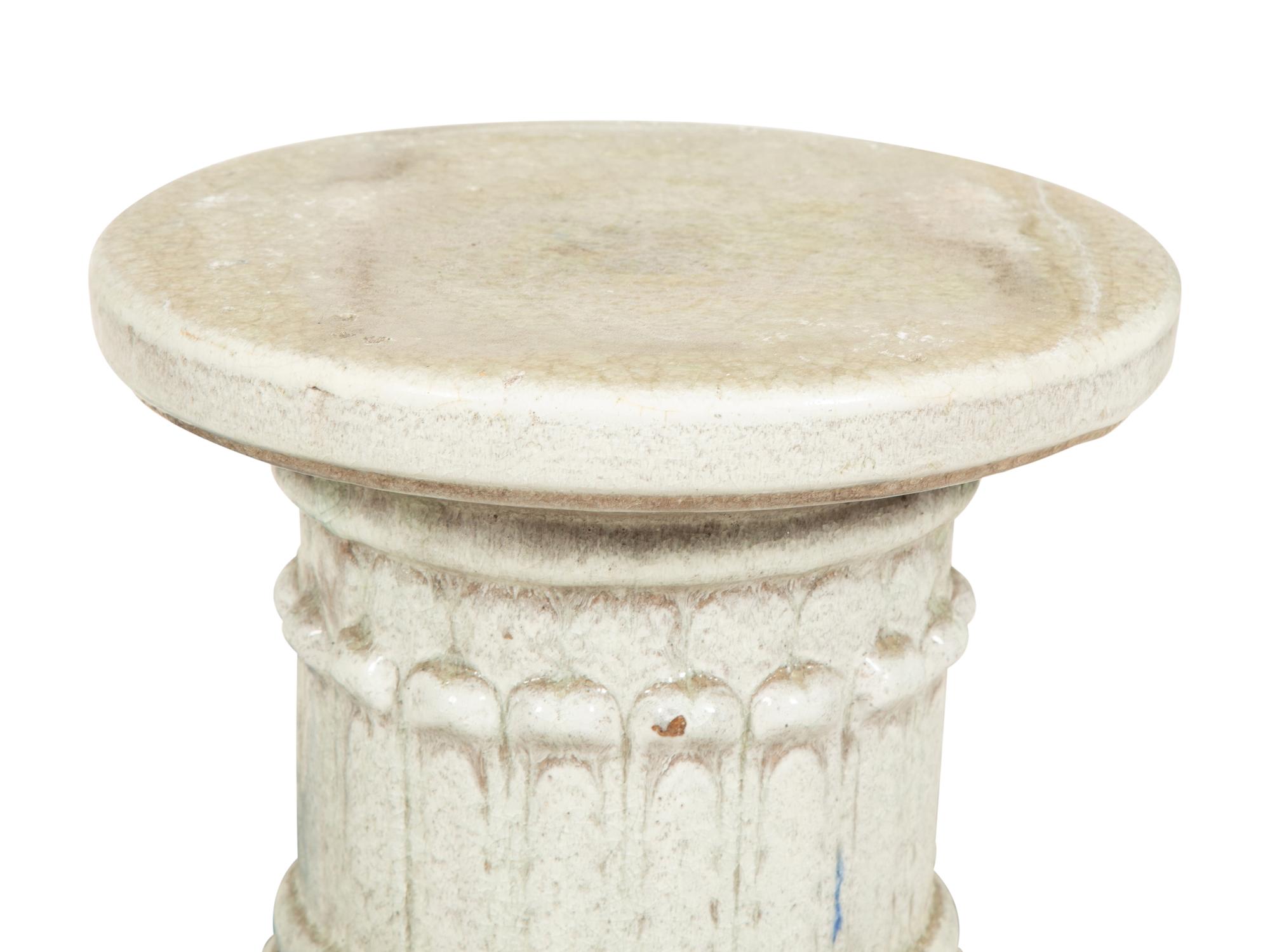 A Pair of Italian Glazed Ceramic Columnar Low Pedestals