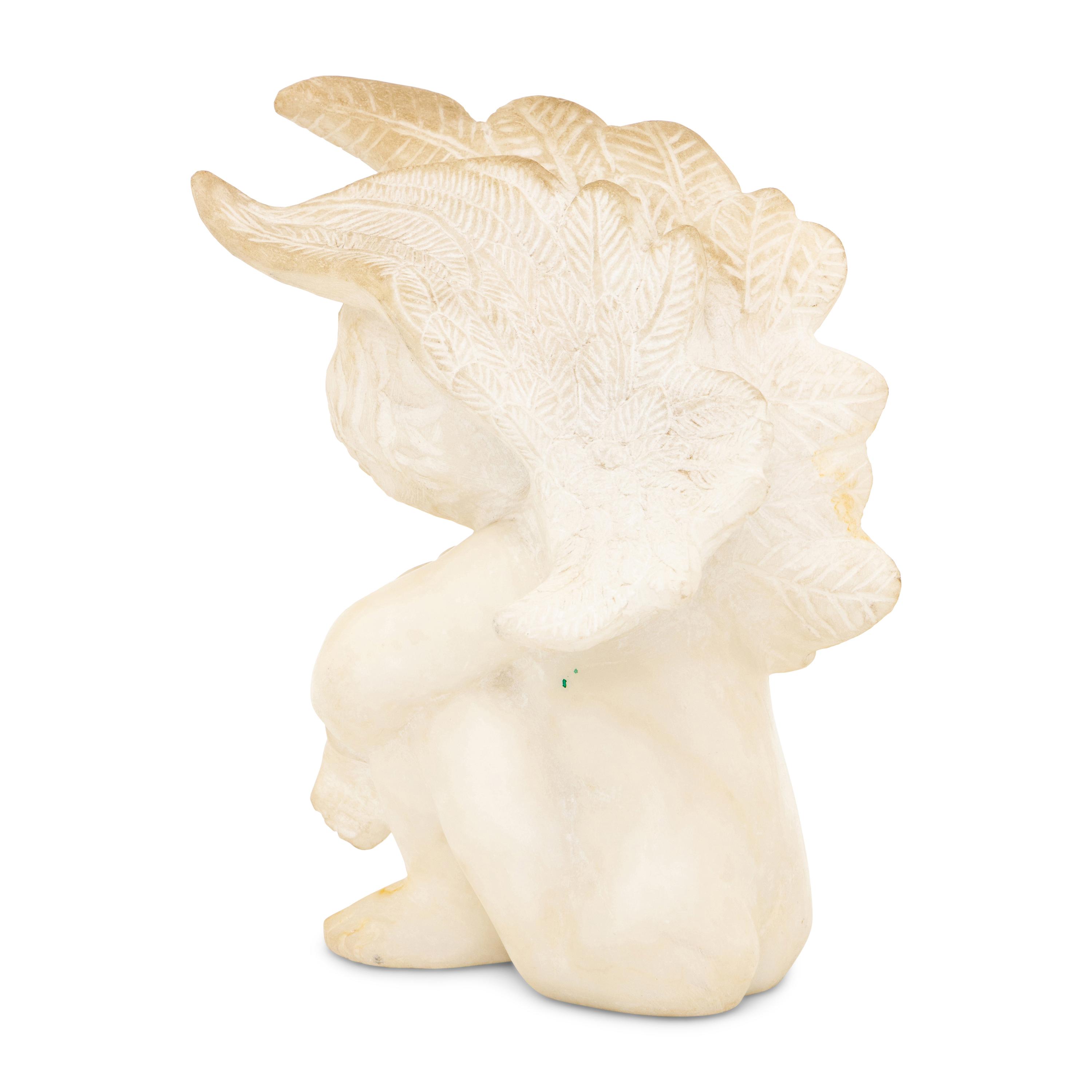 A Marble Figure of a Seated Cherub