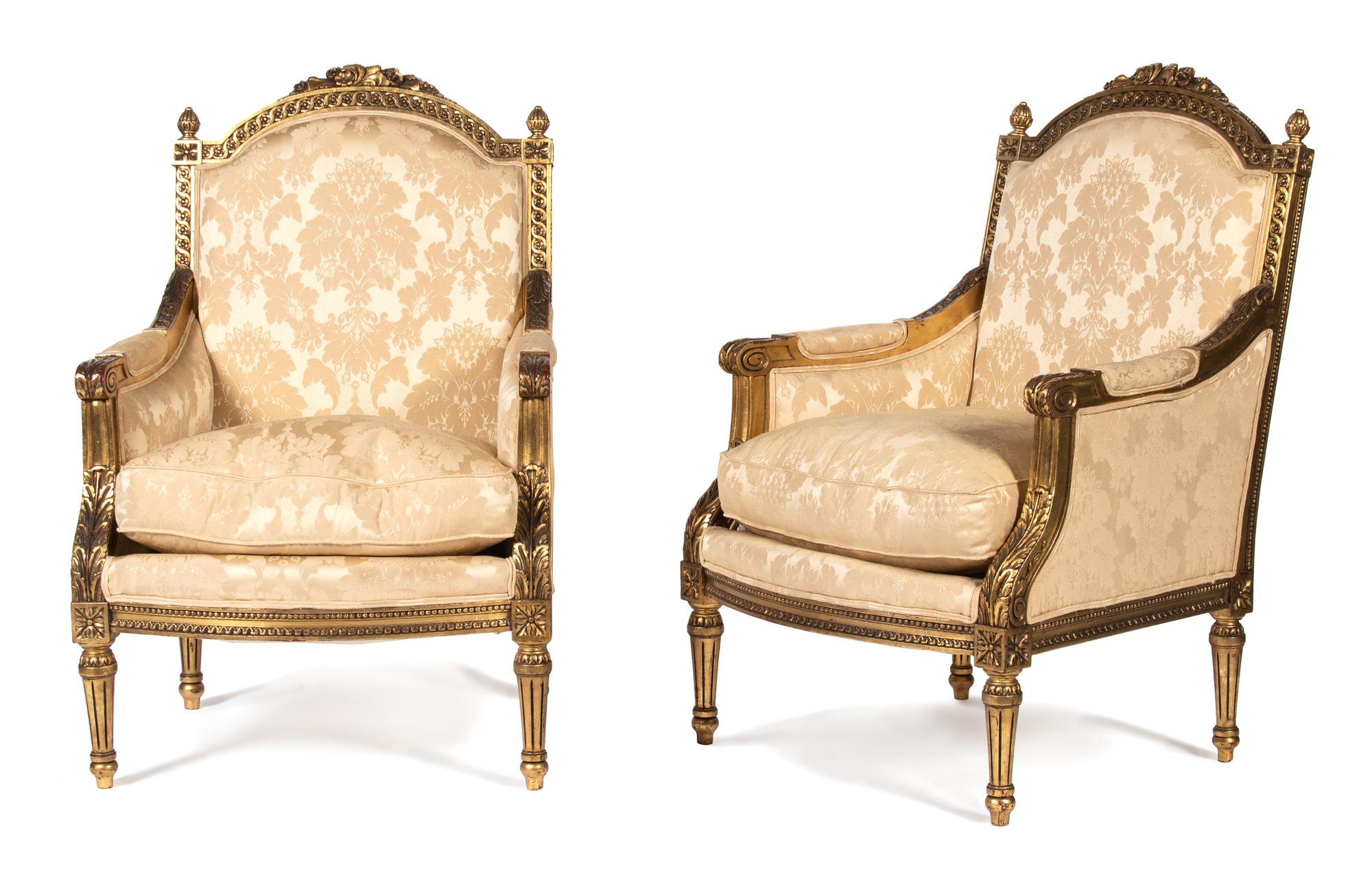A Pair of Louis XVI Style Carved and Painted Bergeres — LATE 19TH/EARLY 20TH CENTURY