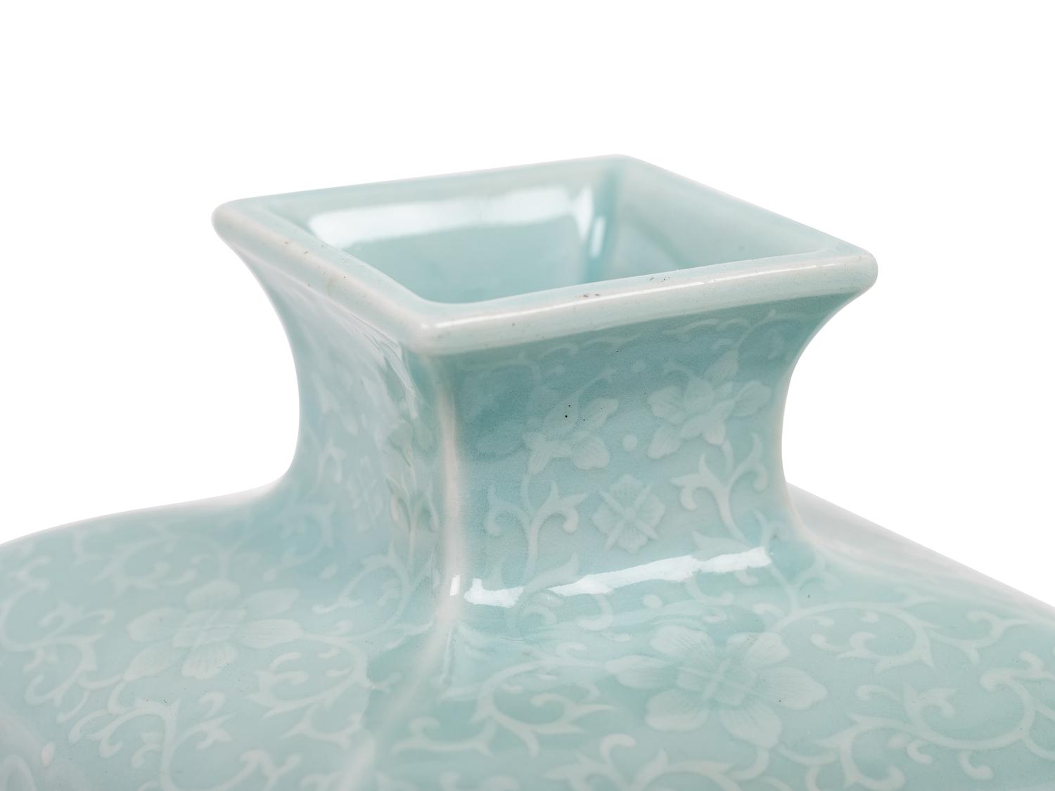 A Chinese Carved Celadon Glazed Porcelain 'Lotus' Vase
