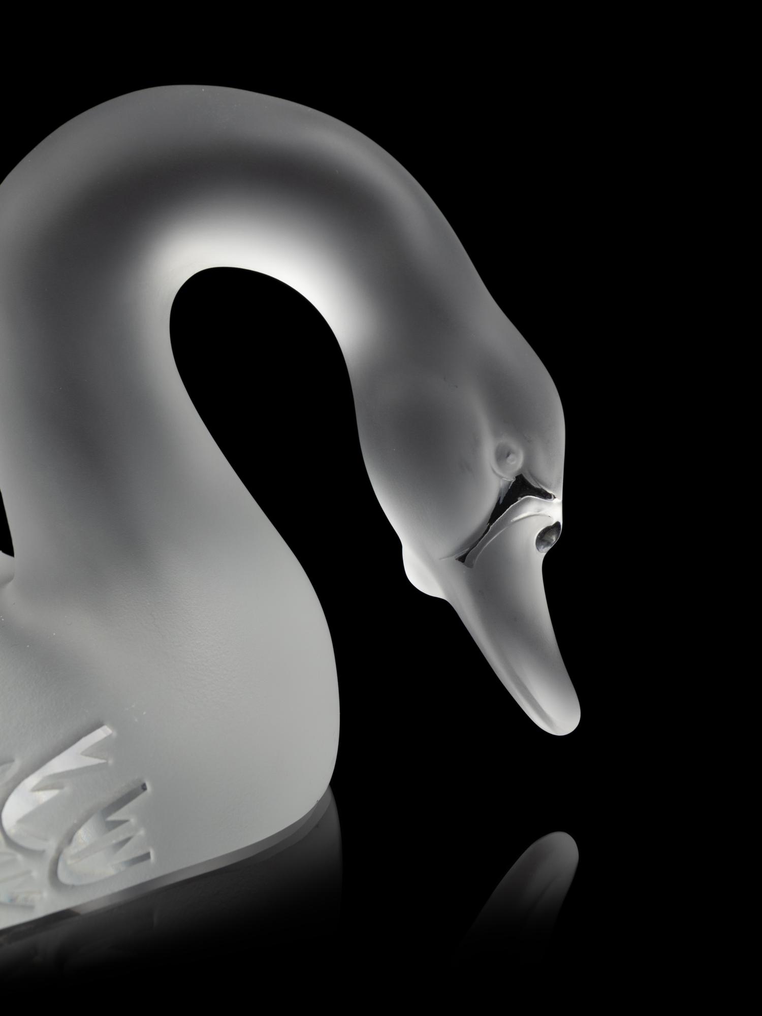 A Pair of Lalique Cygnes Sculptures