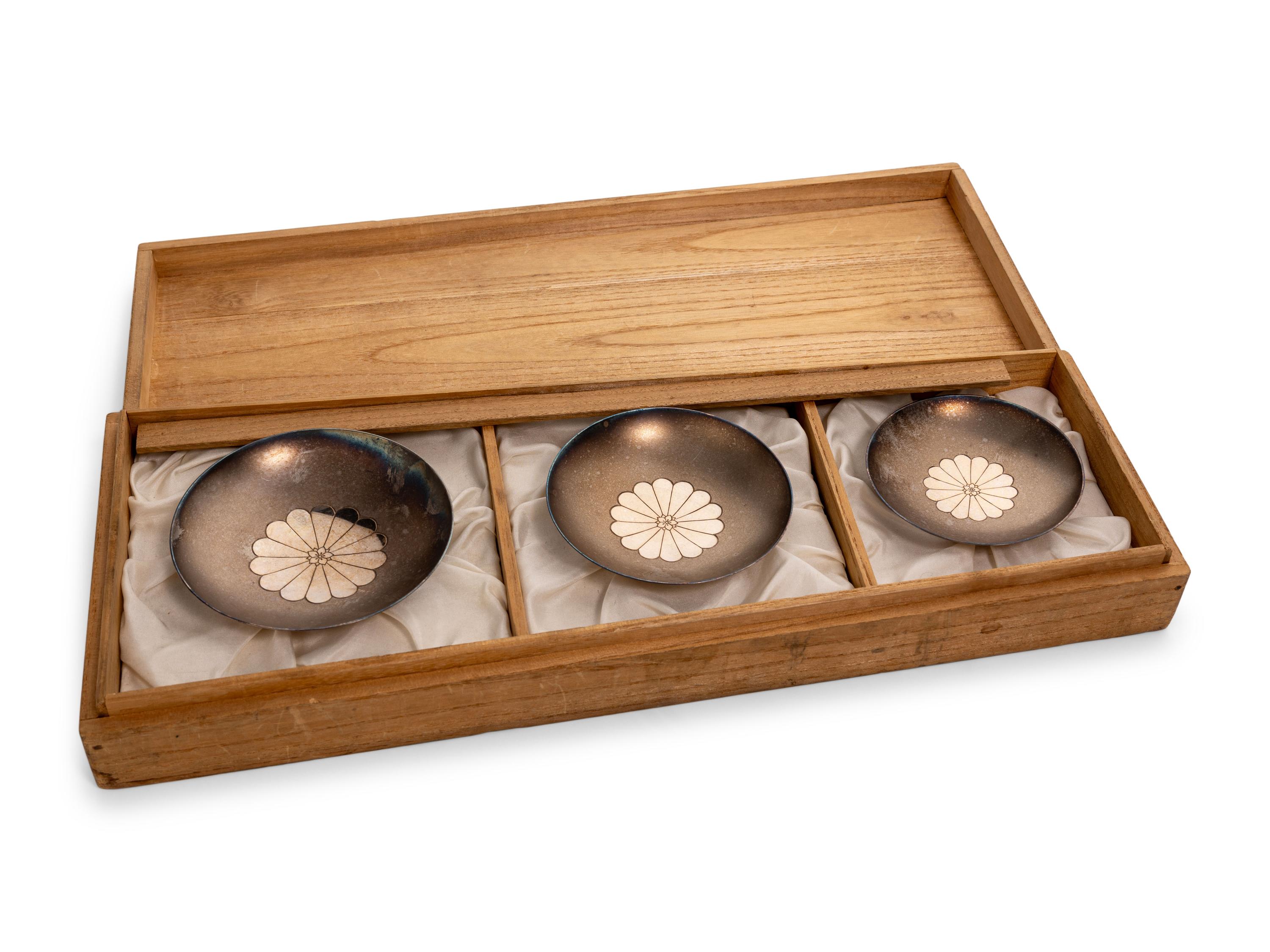 A Set of Three Japanese Silver Sake Cups