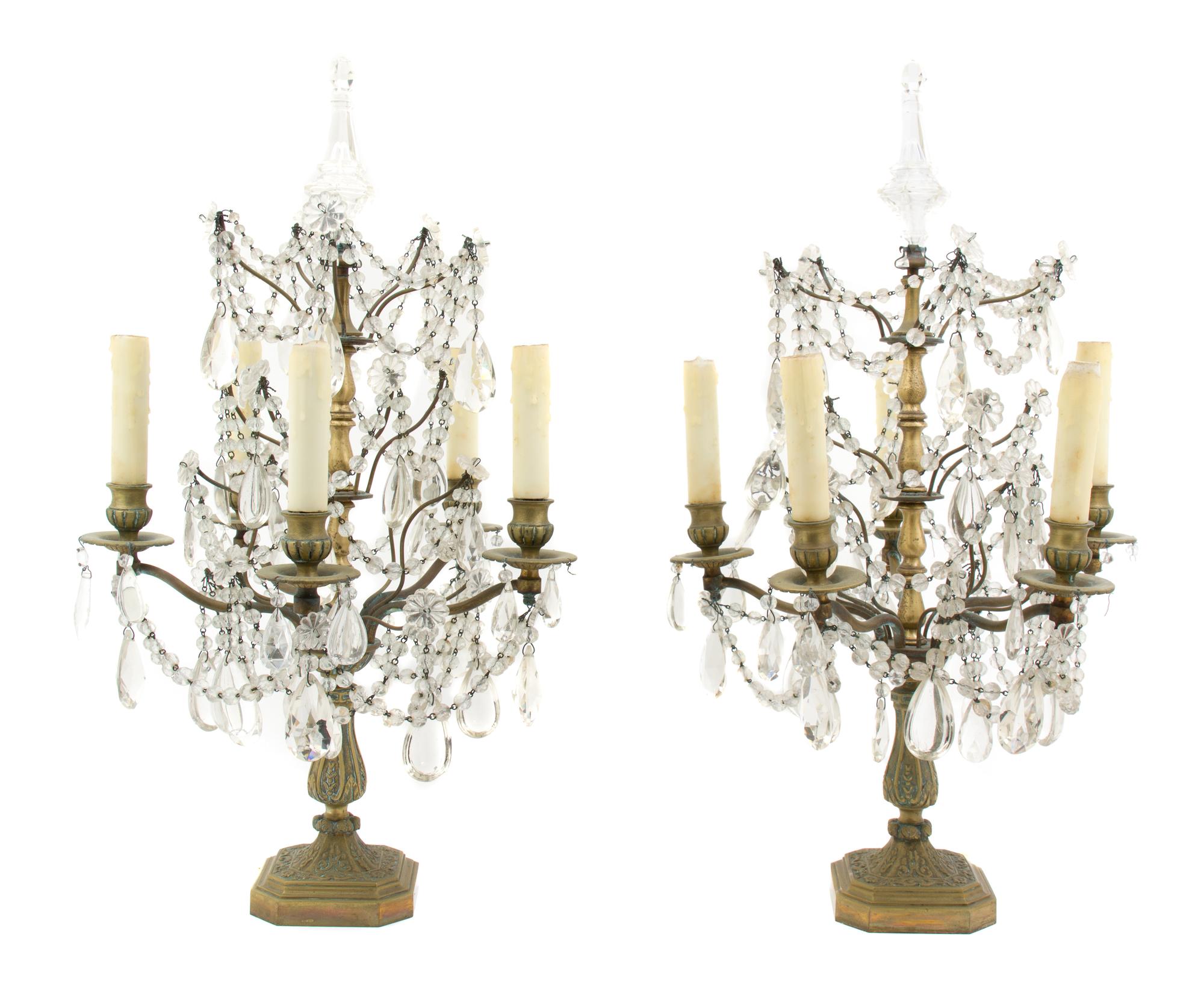 A Pair of French Cut Glass and Brass Five-Light Girandoles, Height 25 inches.