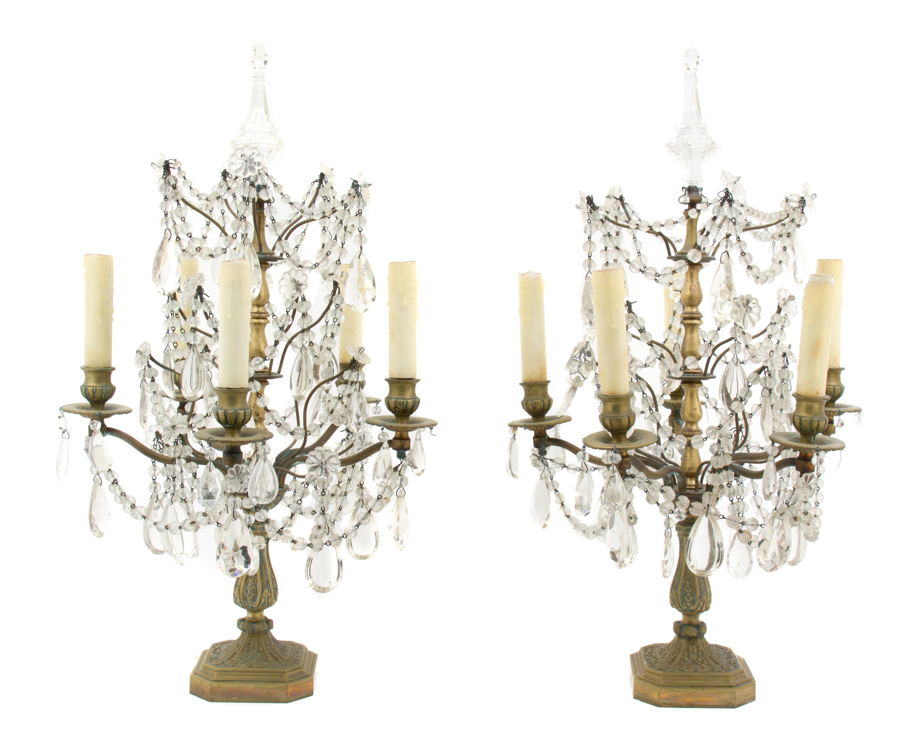A Pair of French Cut Glass and Brass Five-Light Girandoles, Height 25 inches.