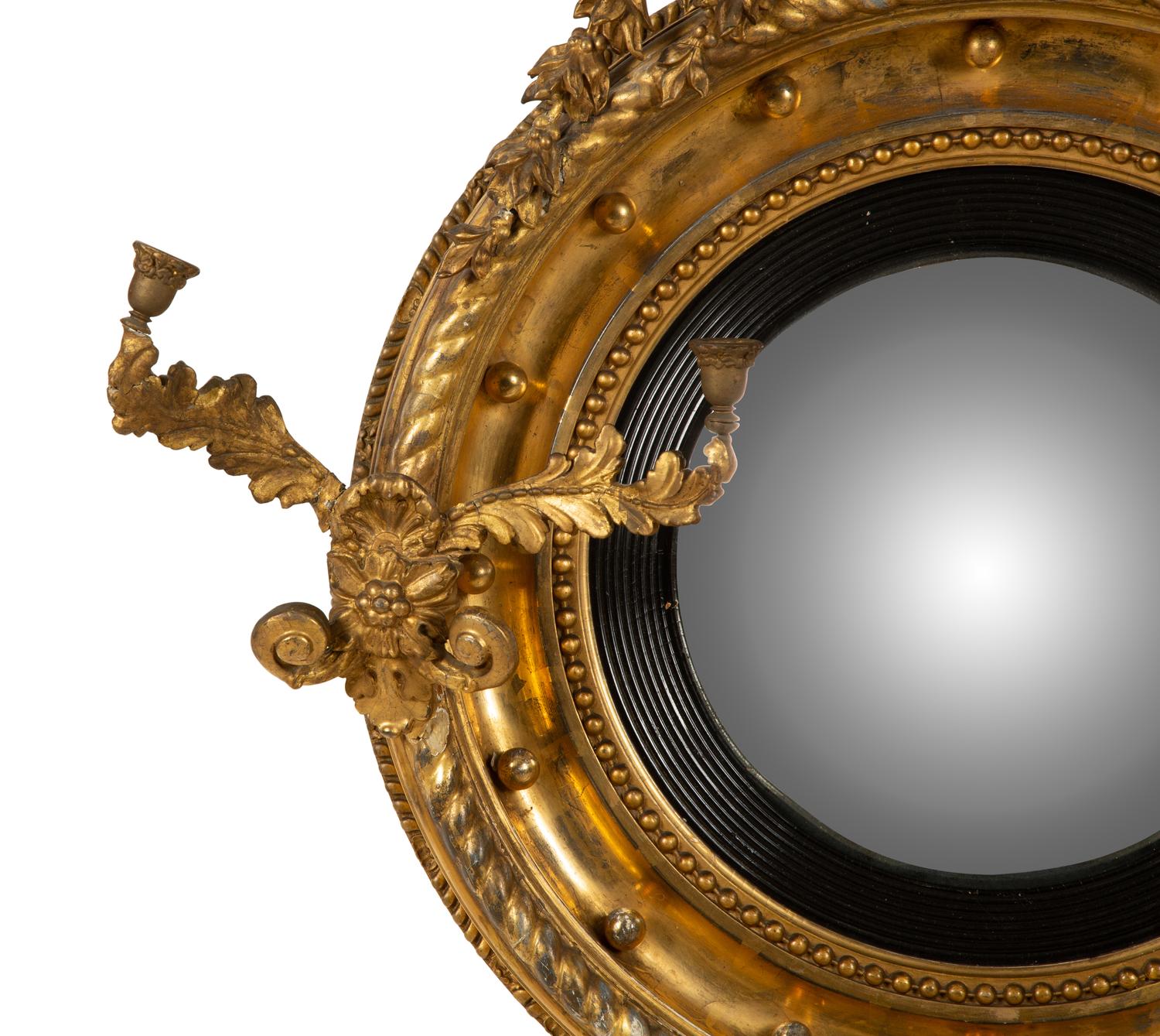 A Regency Giltwood Convex Girandole Mirror