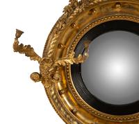 A Regency Giltwood Convex Girandole Mirror