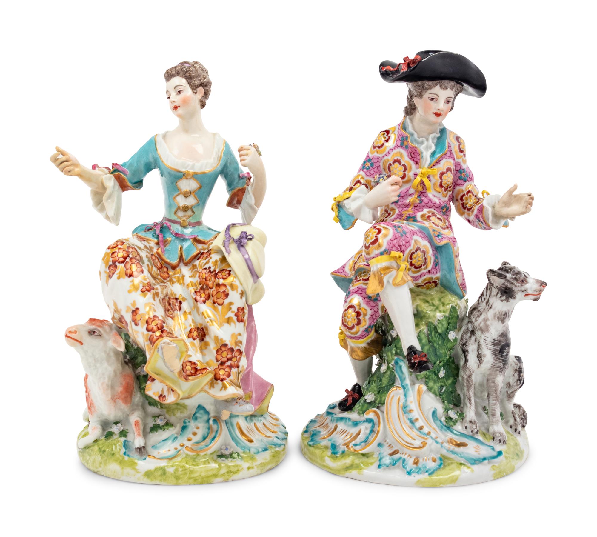 A Pair of Chelsea Porcelain Figural Groups